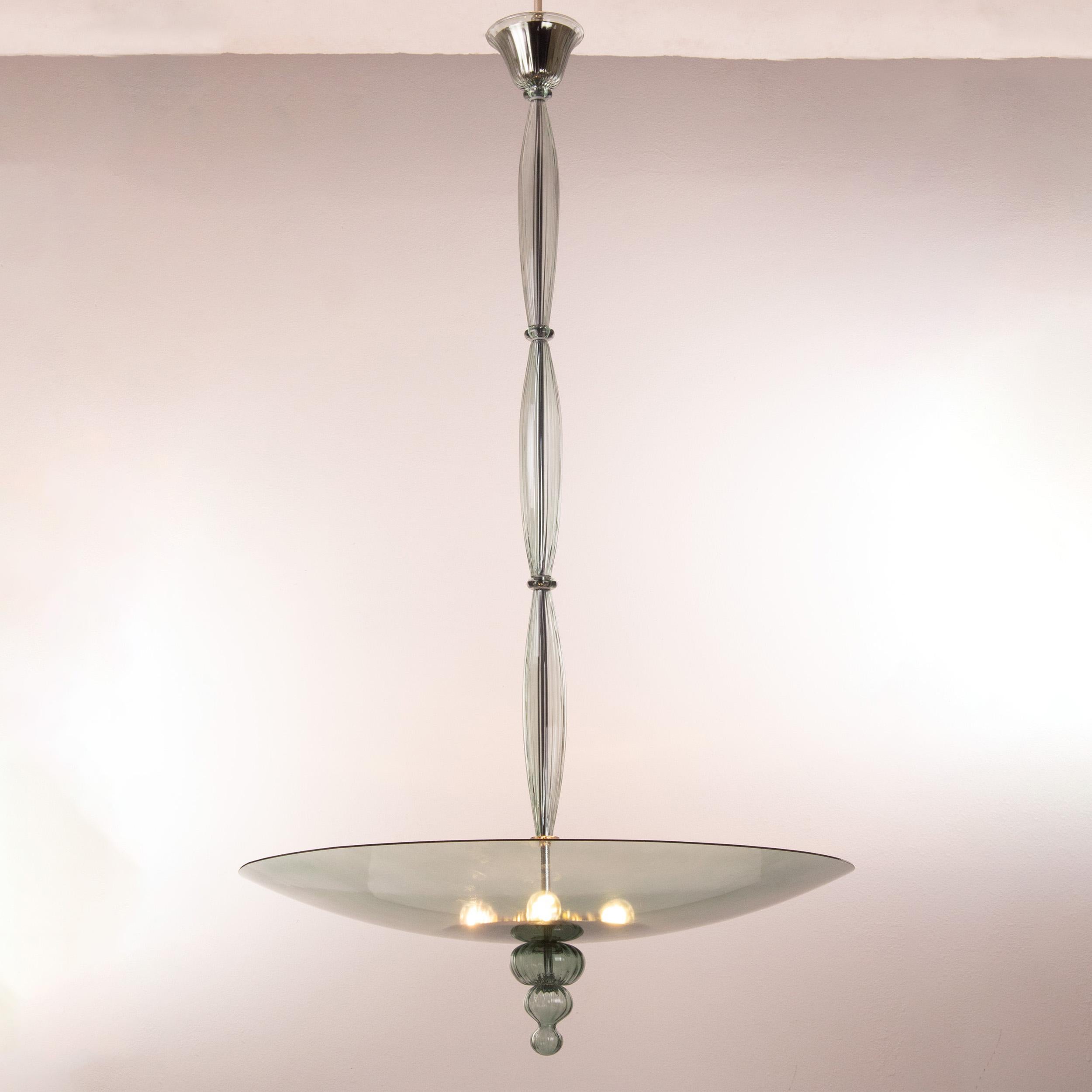 This vintage suspension lighting has a neat and simple design. 
The preciousness of it is in the central rod, the ceiling rosette and the final detail as it has a rigadin handmade texture.

It has 4 lights and the fixture is in nickel