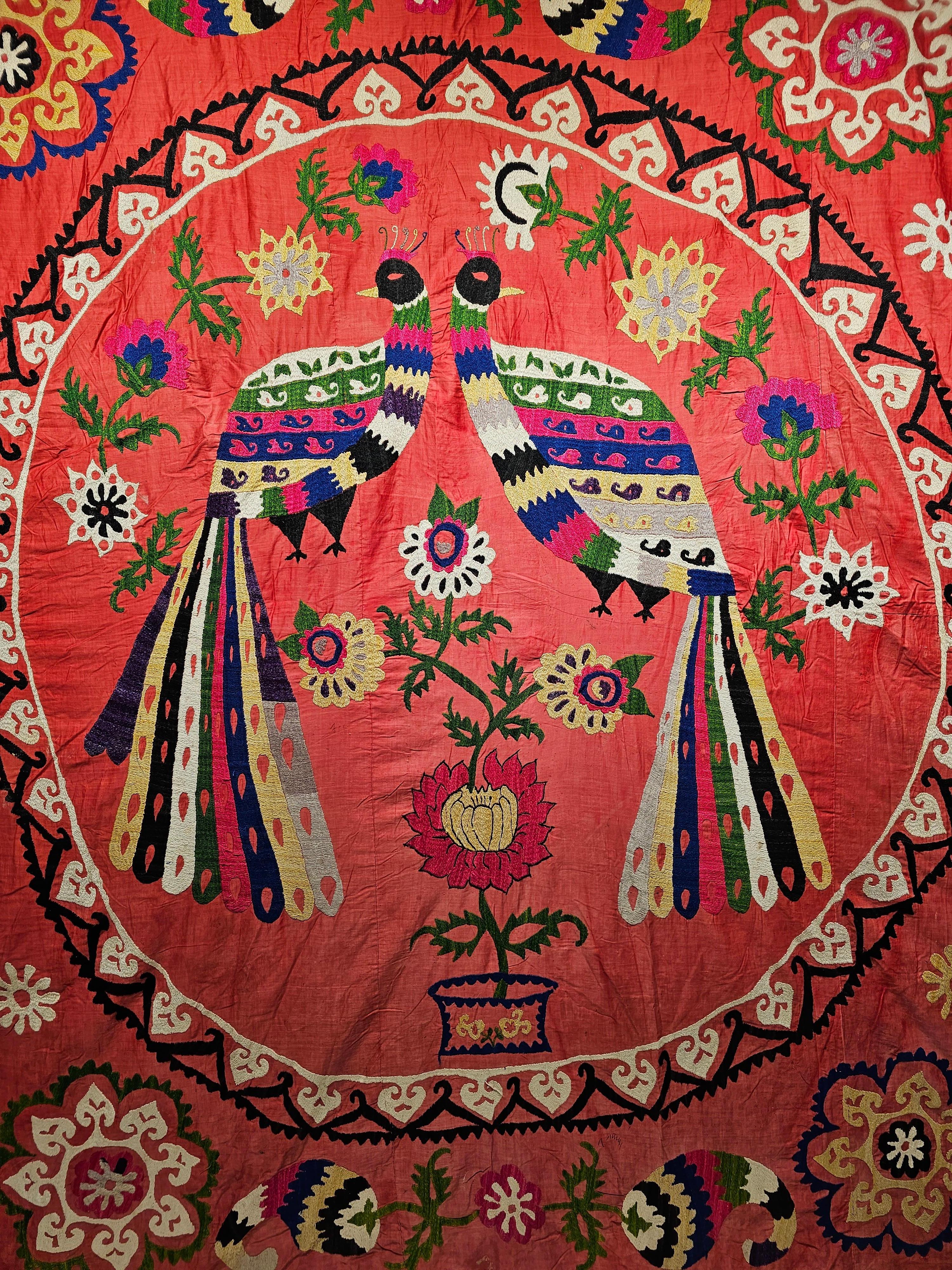 Uzbek Vintage Silk Suzani Hand Embroidered Tapestry Featuring a Pair of Peacocks  For Sale