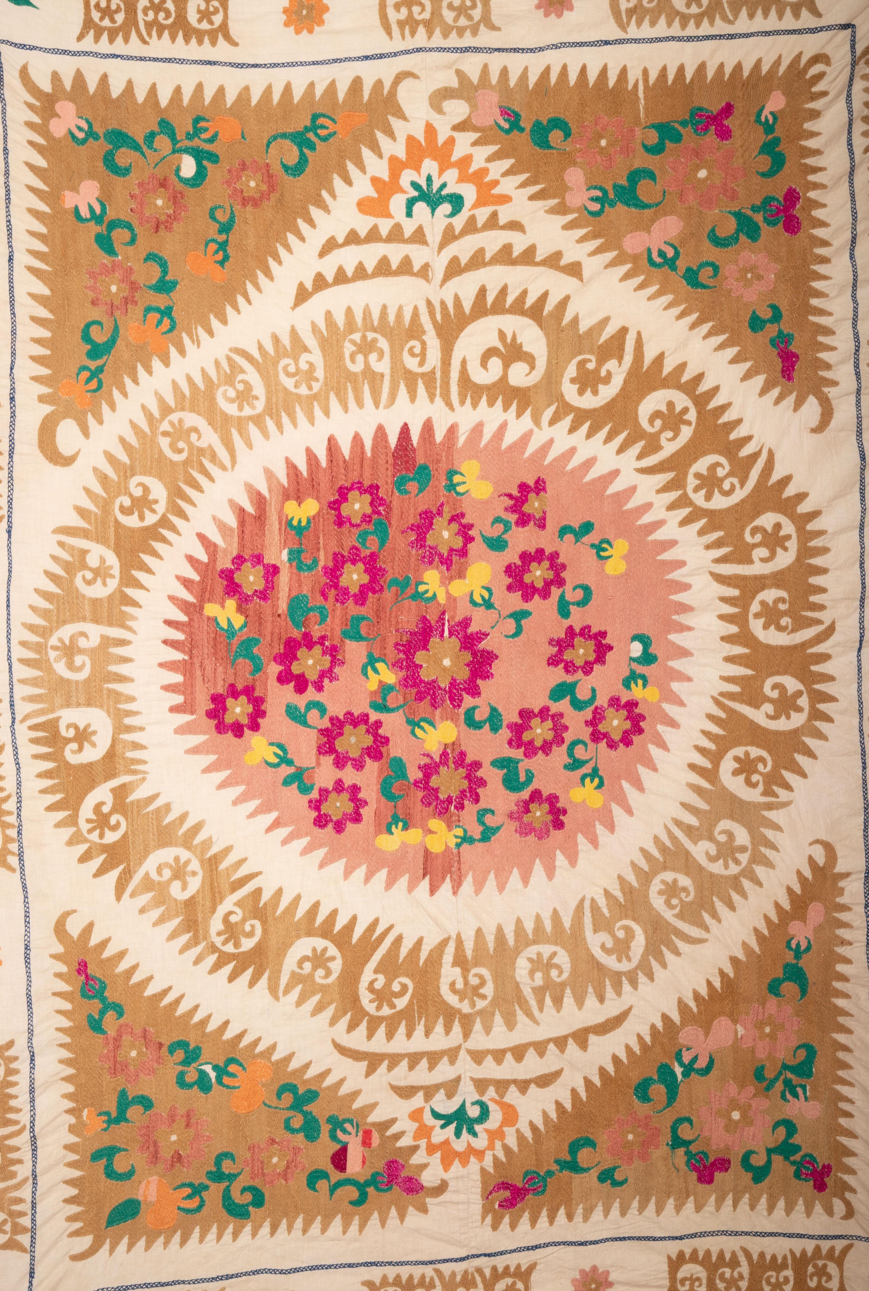 It is unusual with its bold design and smaller size. This group of Samarkand suzanis tend to be either very large or very small, this is in between.