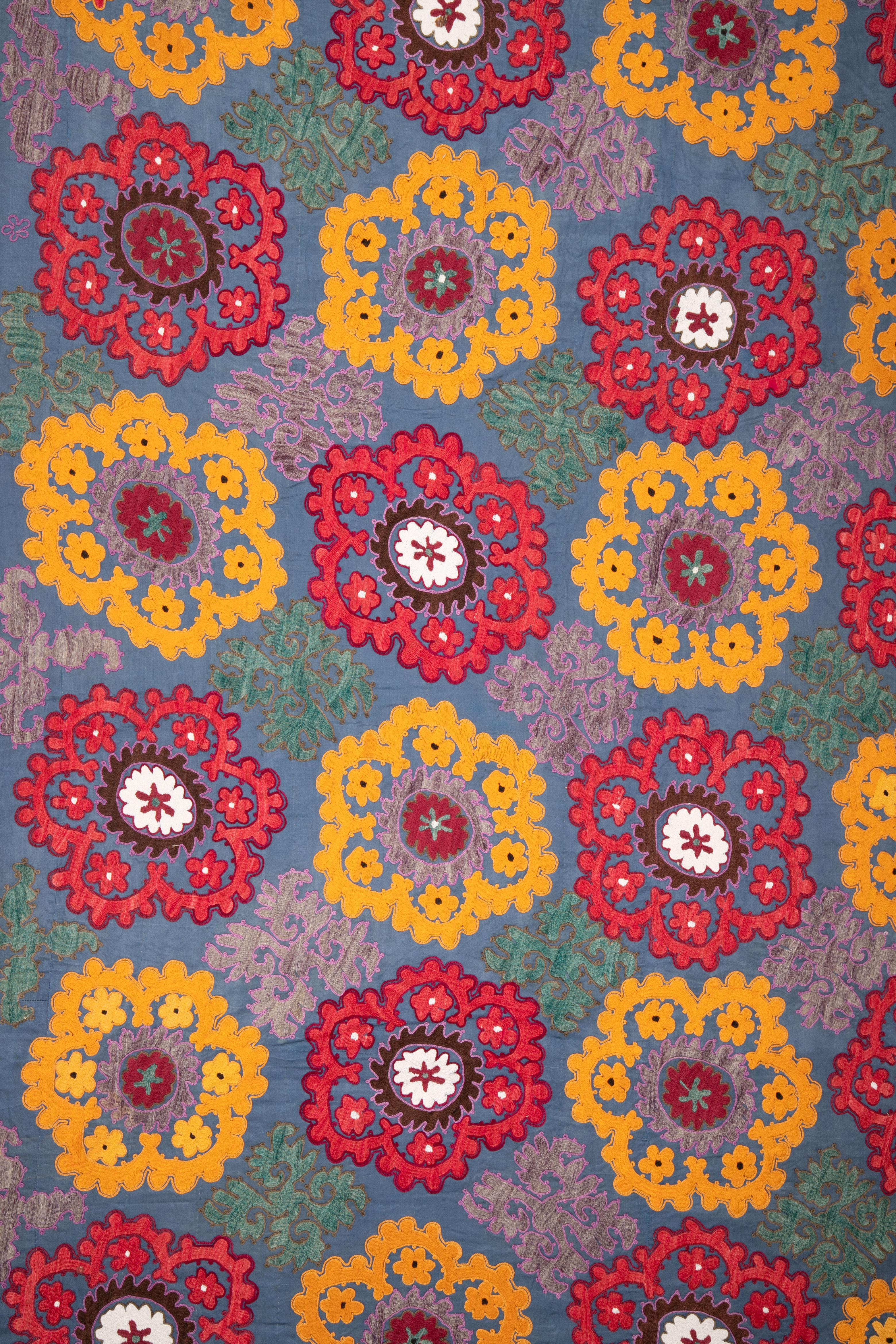 The Suzani has an unusual color palette and has a Russian print lining.