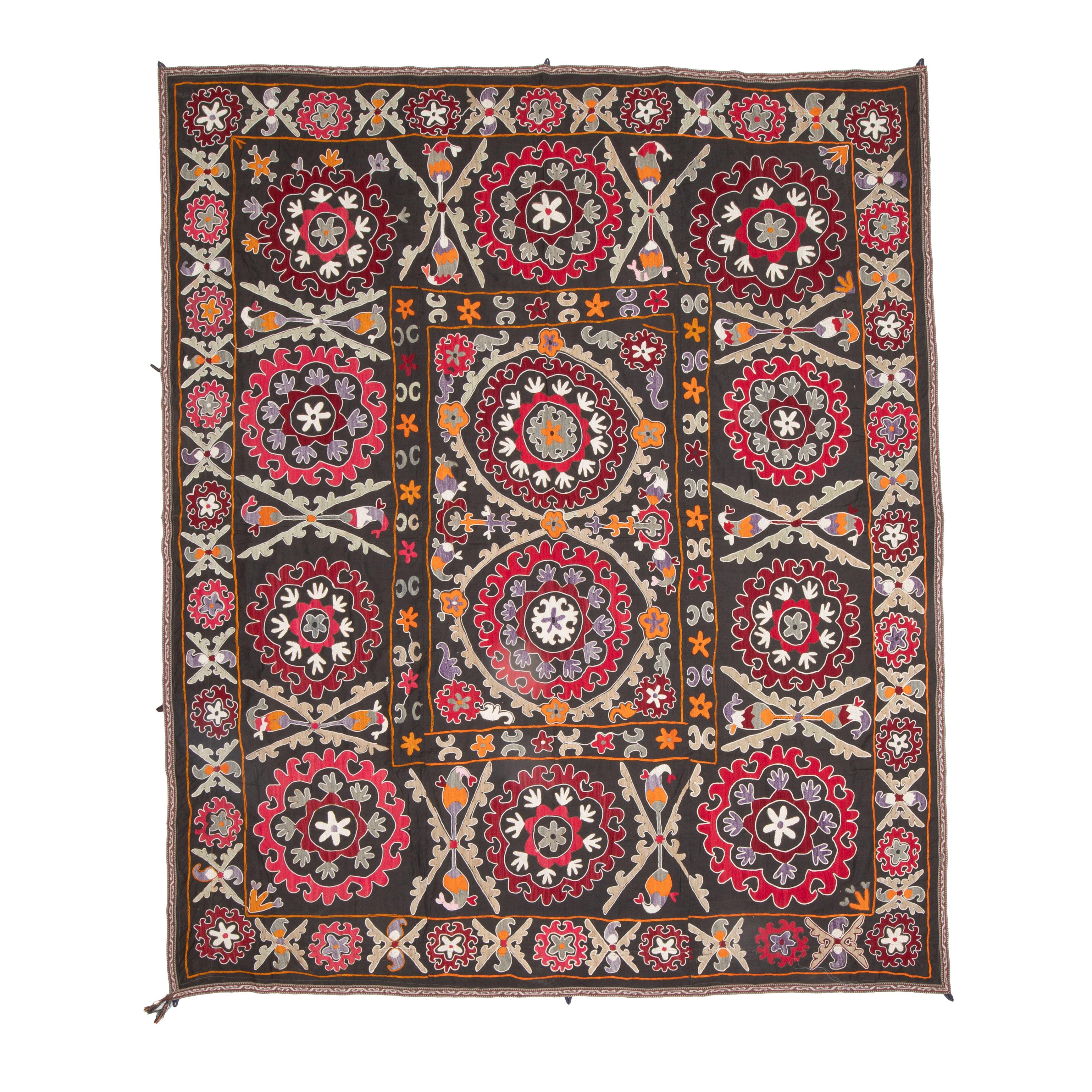 The suzani above is a vintage and used one therefore it is not in brand new condition. It has traces of age and use but nothing to hurt the eye.


General Info On Suzanis

Uzbek Suzani, a captivating textile art form originating from Central Asia,
