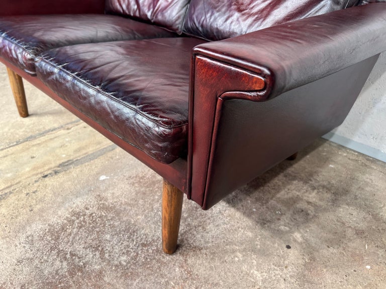 Image showcasing Vintage Svend Skipper Danish 1970 Deep Cherry Leather 2 Seater Leather ...