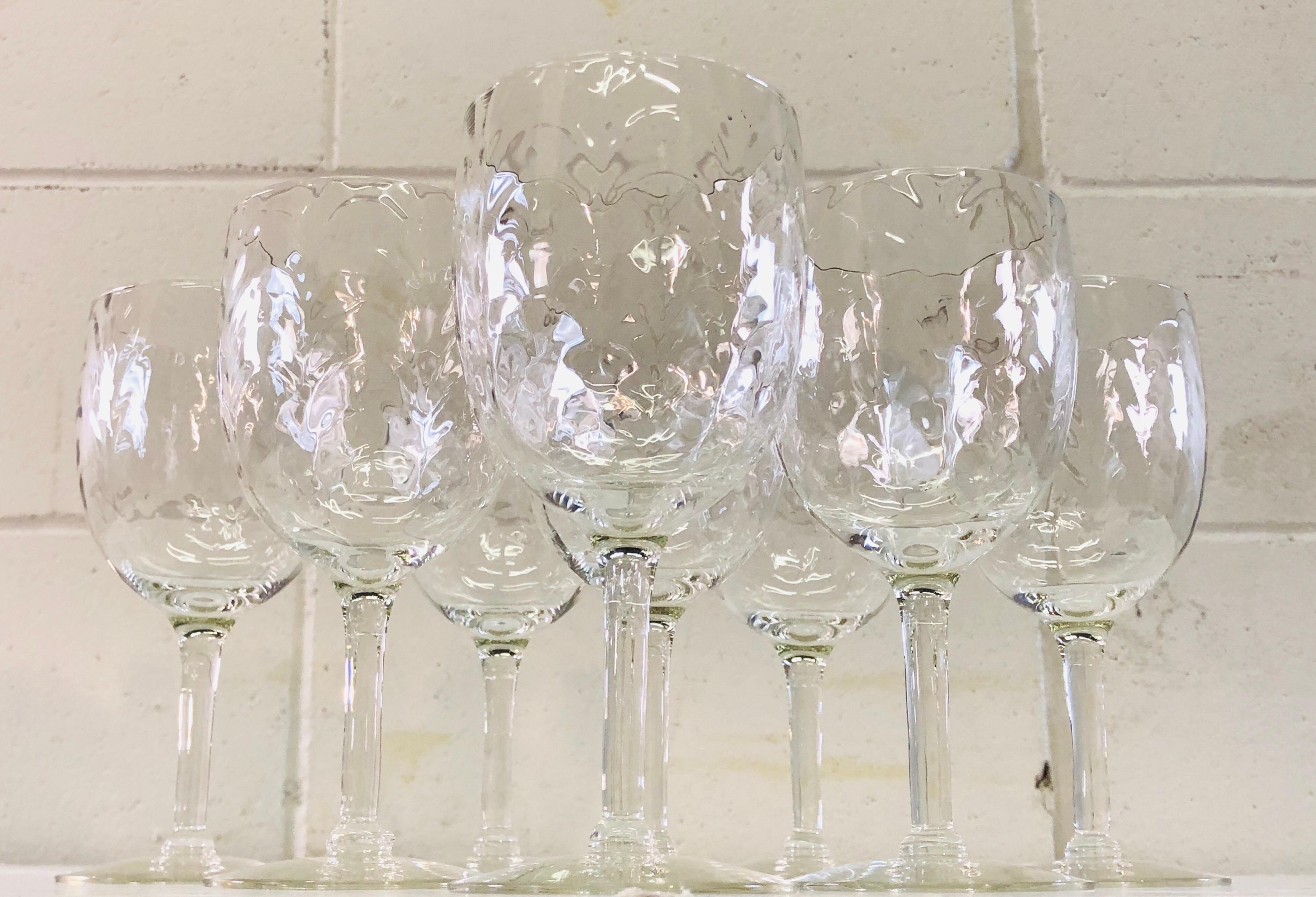 Vintage Mid-Century Modern set of 8 clear glass swag styled tall wine stems. No marks. Excellent condition.