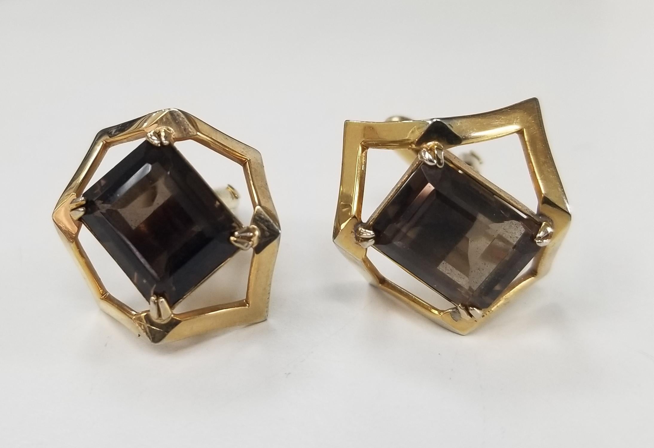 New Old Stock 1970's Swank Cuff links. Features the beautiful smokey quartz in a gold tone setting and metal gold tone.
Perfect for the hot, vintage loving dude in your life! There are absolute attention grabbers because of the rare design and