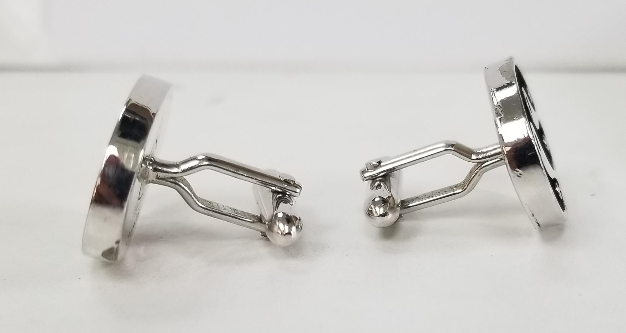 New Old Stock 1970's Swank Cuff links. Features the beautiful Ying and Yang in a white gold tone metal .
Perfect for the hot, vintage loving dude in your life! There are absolute attention grabbers  - they just glow when the light hits them!