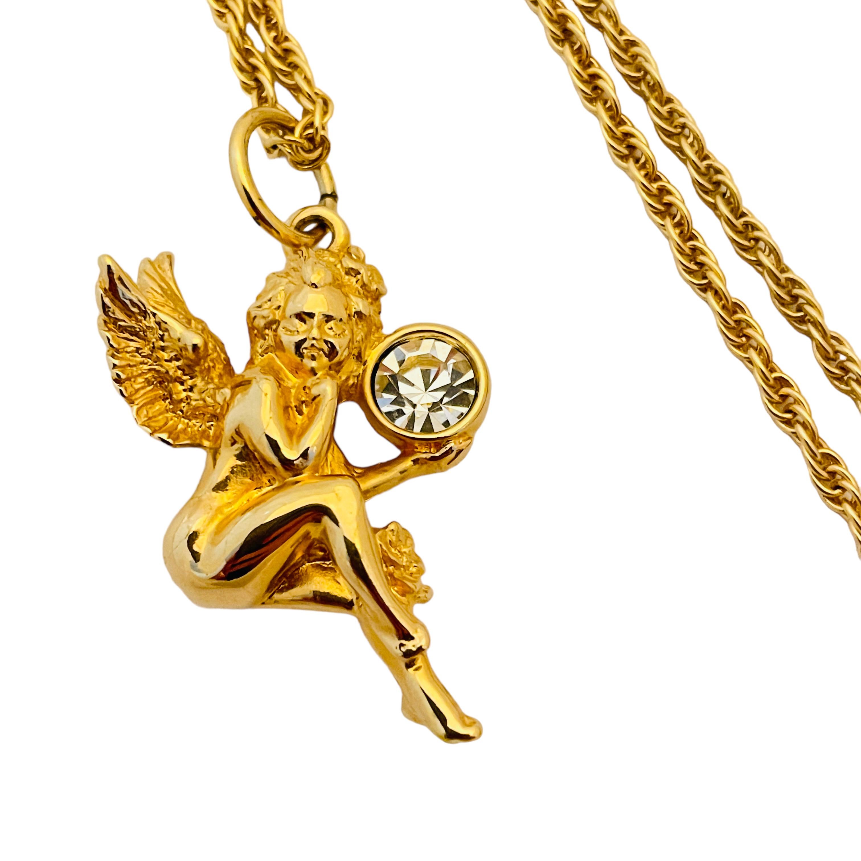 Vintage SWAROVSKI gold crystal angel pendant designer necklace  In Excellent Condition For Sale In Palos Hills, IL