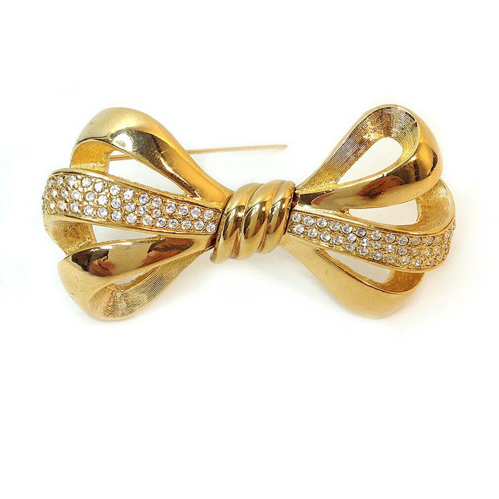 Round Cut Vintage Swarovski Golden Bow Brooch For Sale