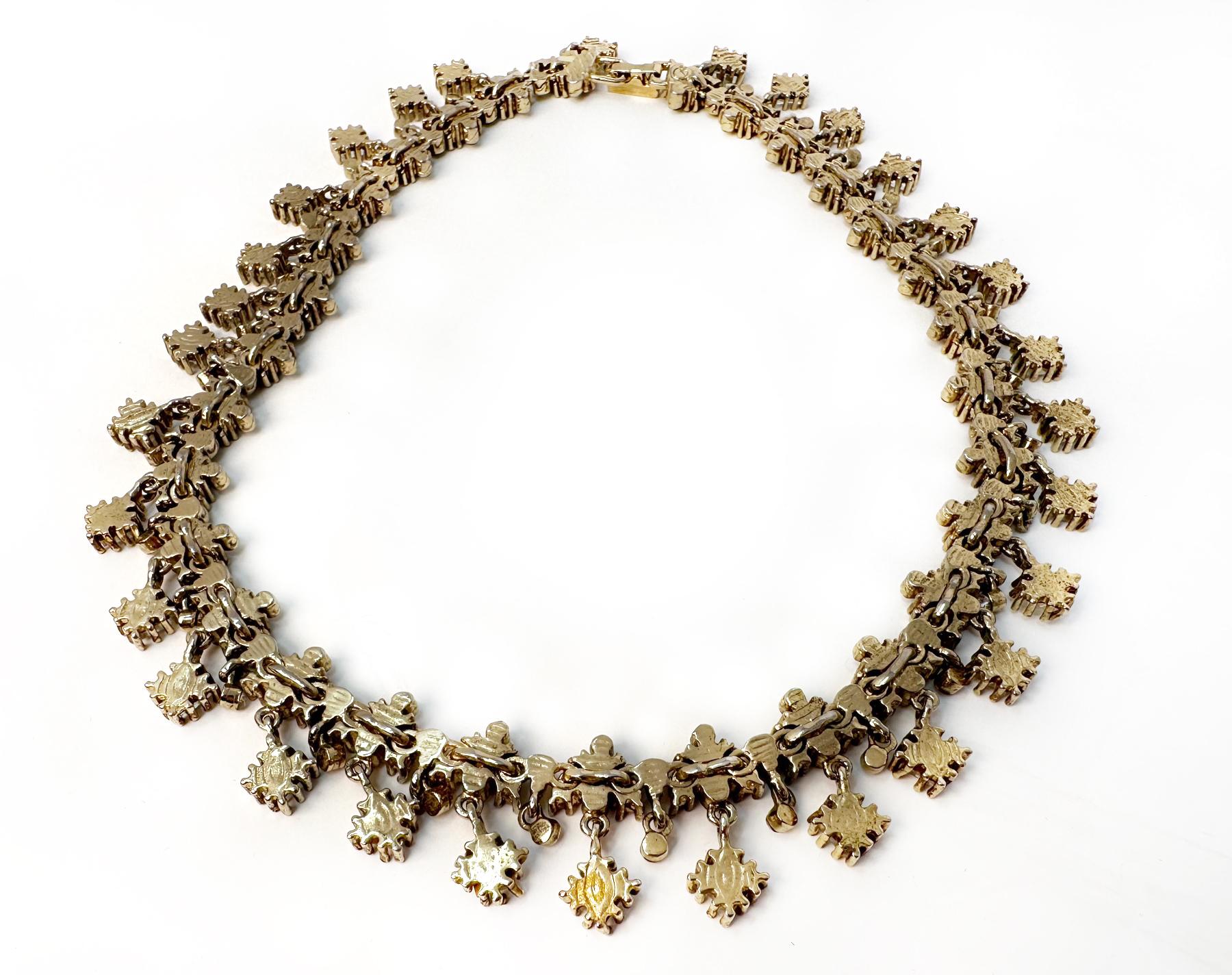 VINTAGE SWAROVSKI REDAND CLEAR  CRYSTAL/MIRROR CHOKER NECKLACE 

About the Item
This stunning Daniel Swarovski Paris couture jeweled choker necklace features an around-the-neck shape with Victorian-Mughal inspired flair. The choker is built with