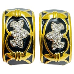Vintage SWAROVSKI firmado swsn logotipo chapado en oro esmalte diseñador clip en pendientes