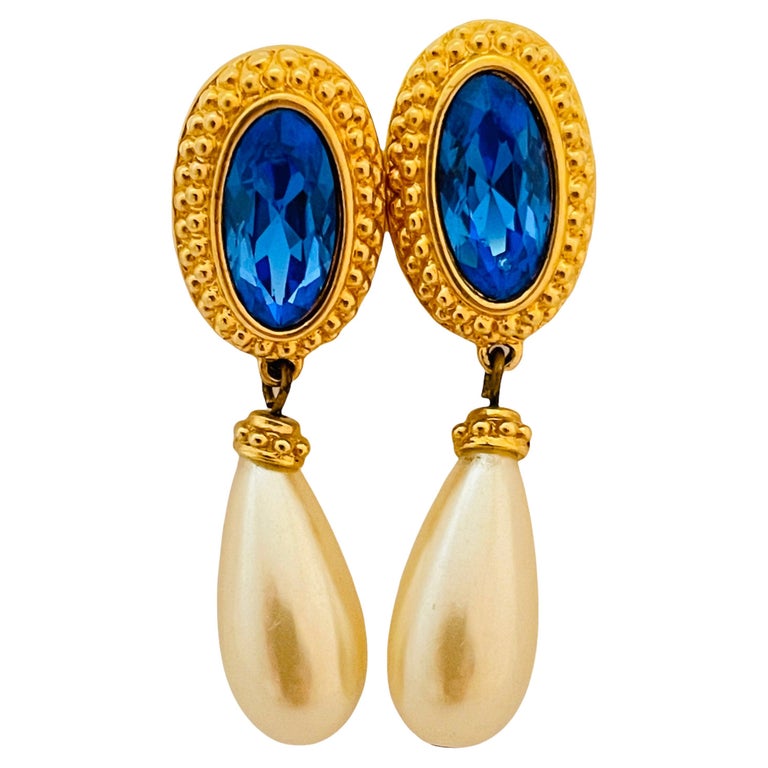 Vintage SWAROVSKI swan gold blue crystal drop pearl designer runway earrings  For Sale at 1stDibs | swarovski swan pearl earrings, swan logo jewelry,  swarovski blue crystal drop earrings