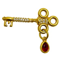 Vintage SWAROVSKI swan signed gold plated dangle crystals key designer brooch