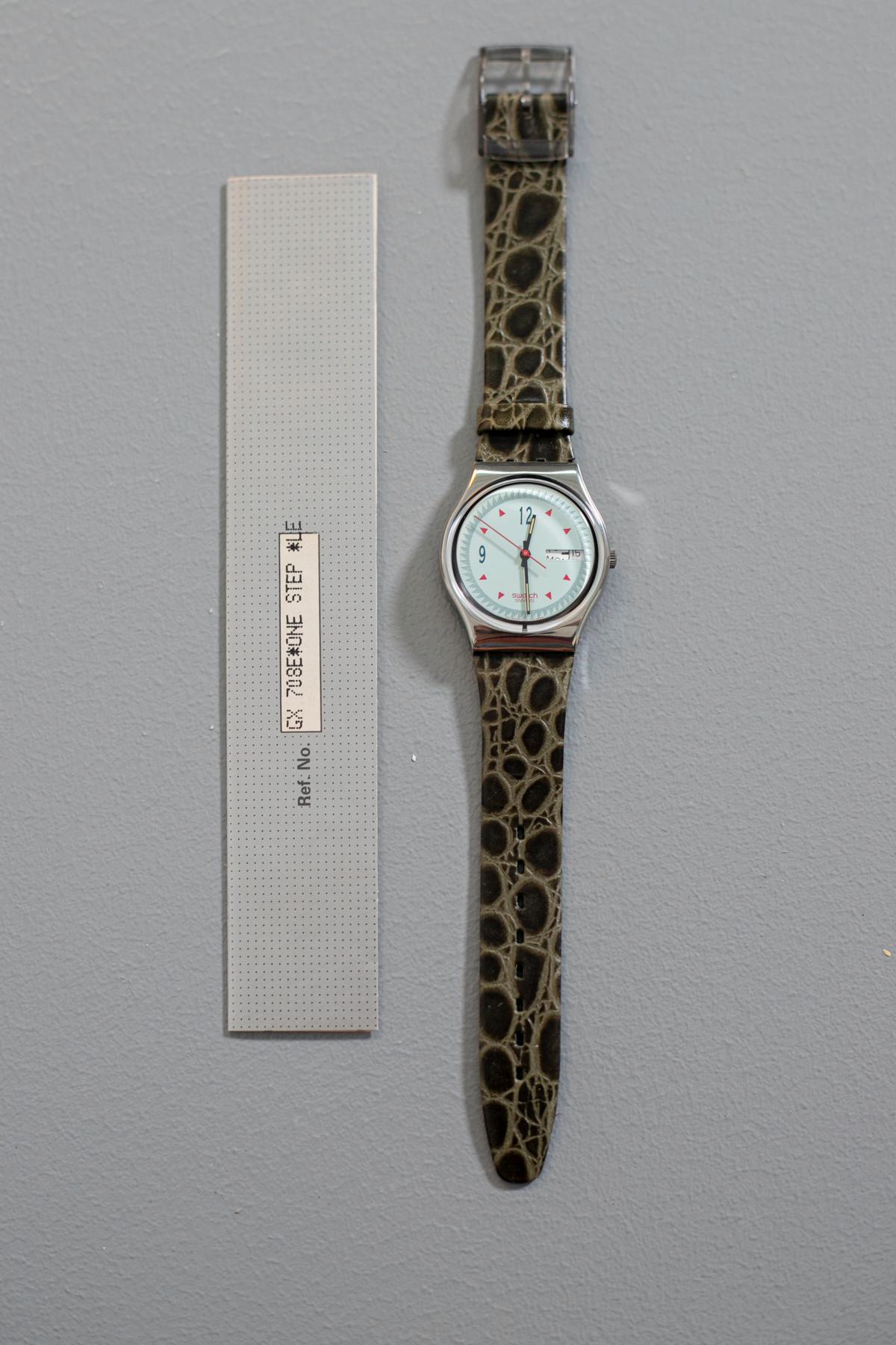 Swatch Vintage from the 1991 collection with a timeless design strap: imitation crocodile skin in a prestigious English green. This watch is highly recommended for those who love classic details without exaggeration.

Case Material: Plastic
Strap