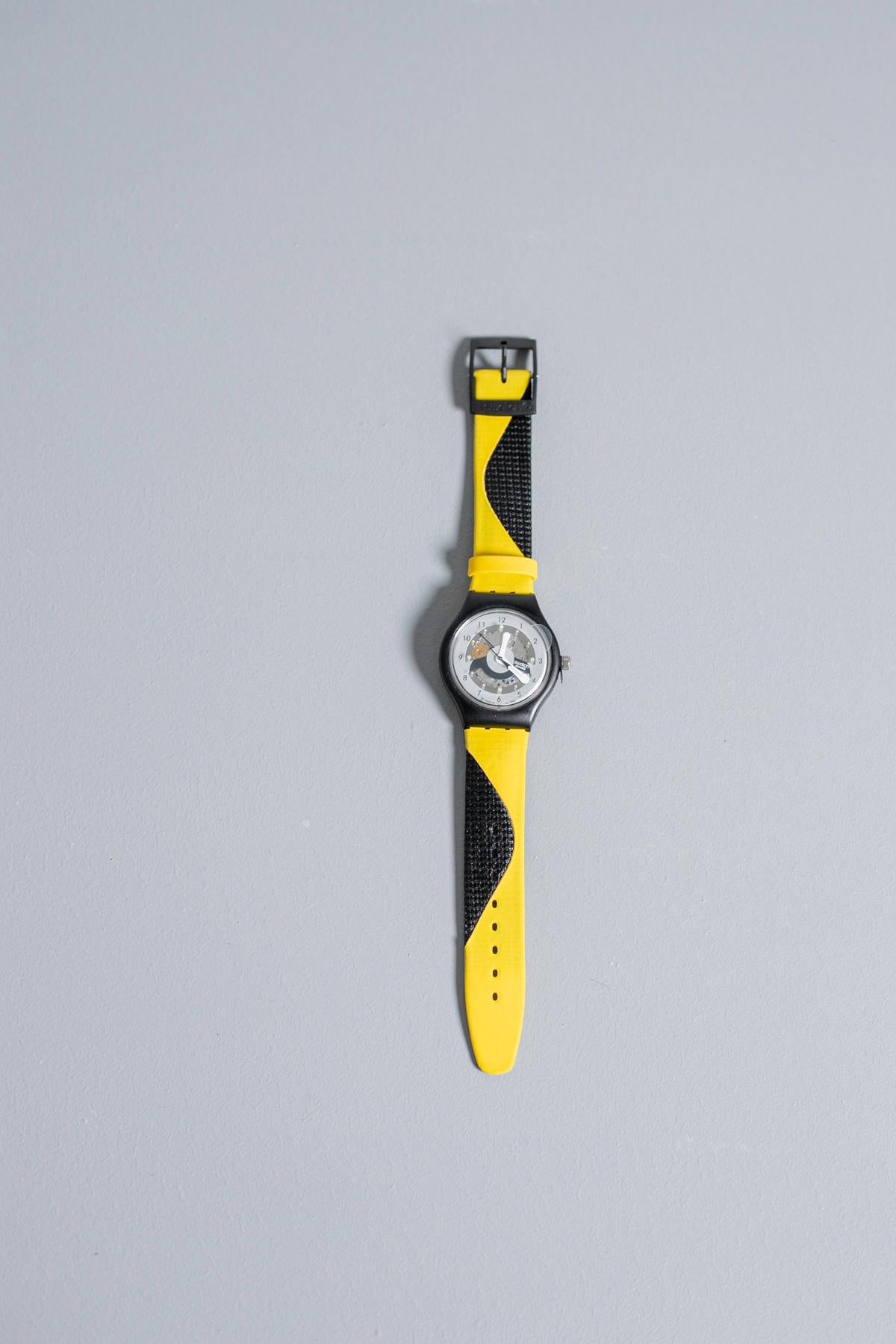 yellow swatch watch
