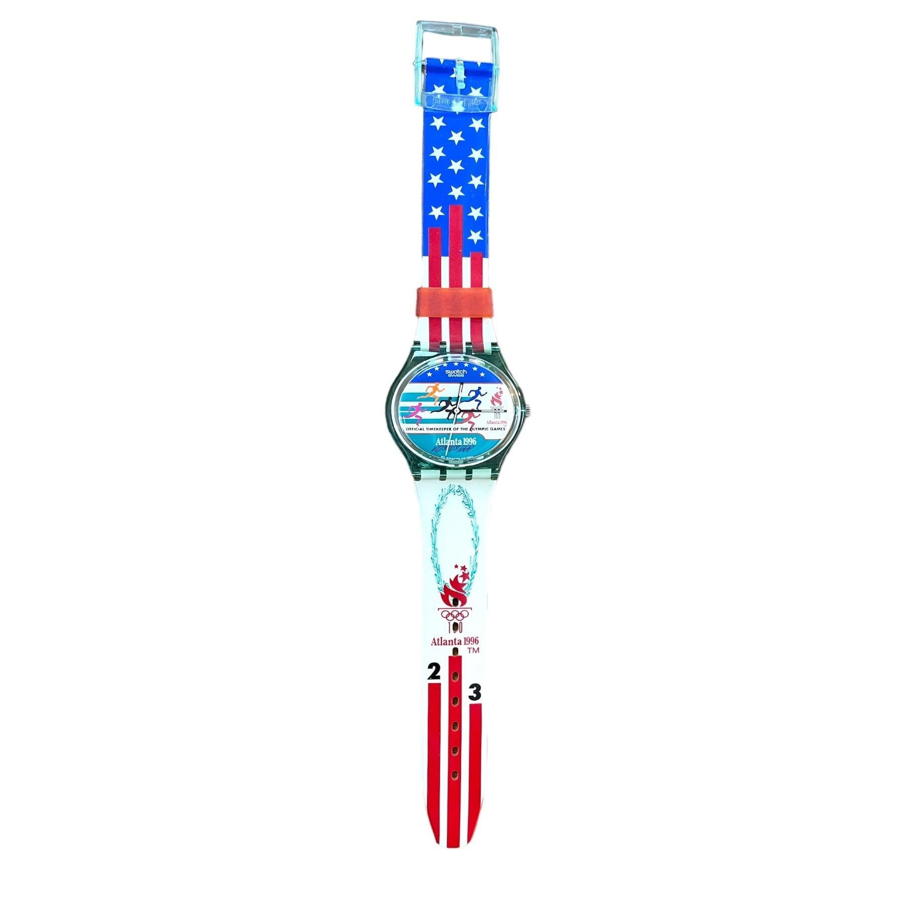 Introducing the Vintage Swatch Swiss Atlanta 1996 Olympic Games LX106 Men's Wrist Watch, the official timekeeper of the historic Centennial Olympic Games in Atlanta. This brand new vintage timepiece holds a piece of Olympic history and adds a touch