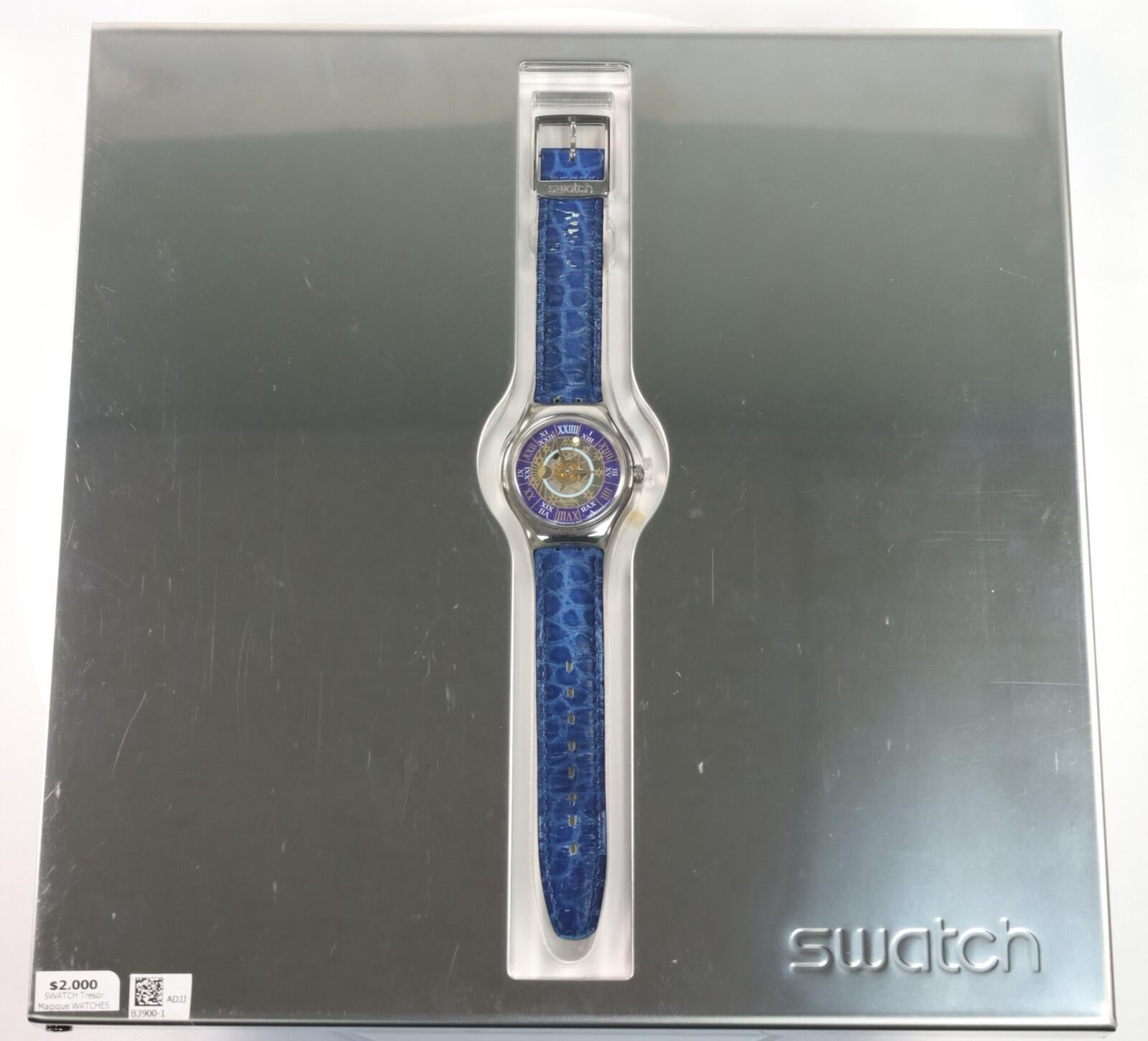Reloj Swatch Vintage Tresor Magique Platino con estuche de presentación en venta 6