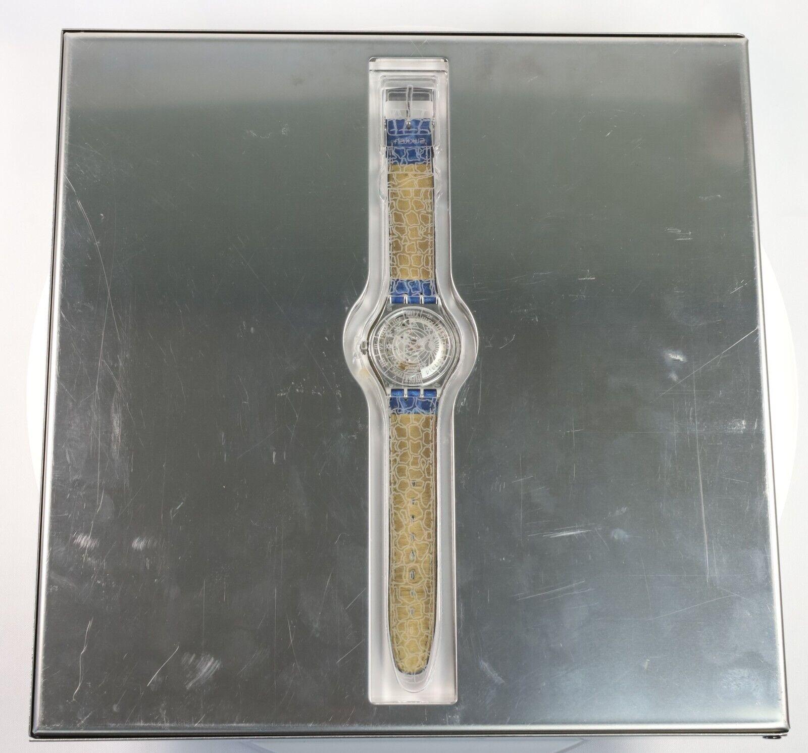 Reloj Swatch Vintage Tresor Magique Platino con estuche de presentación en venta 7