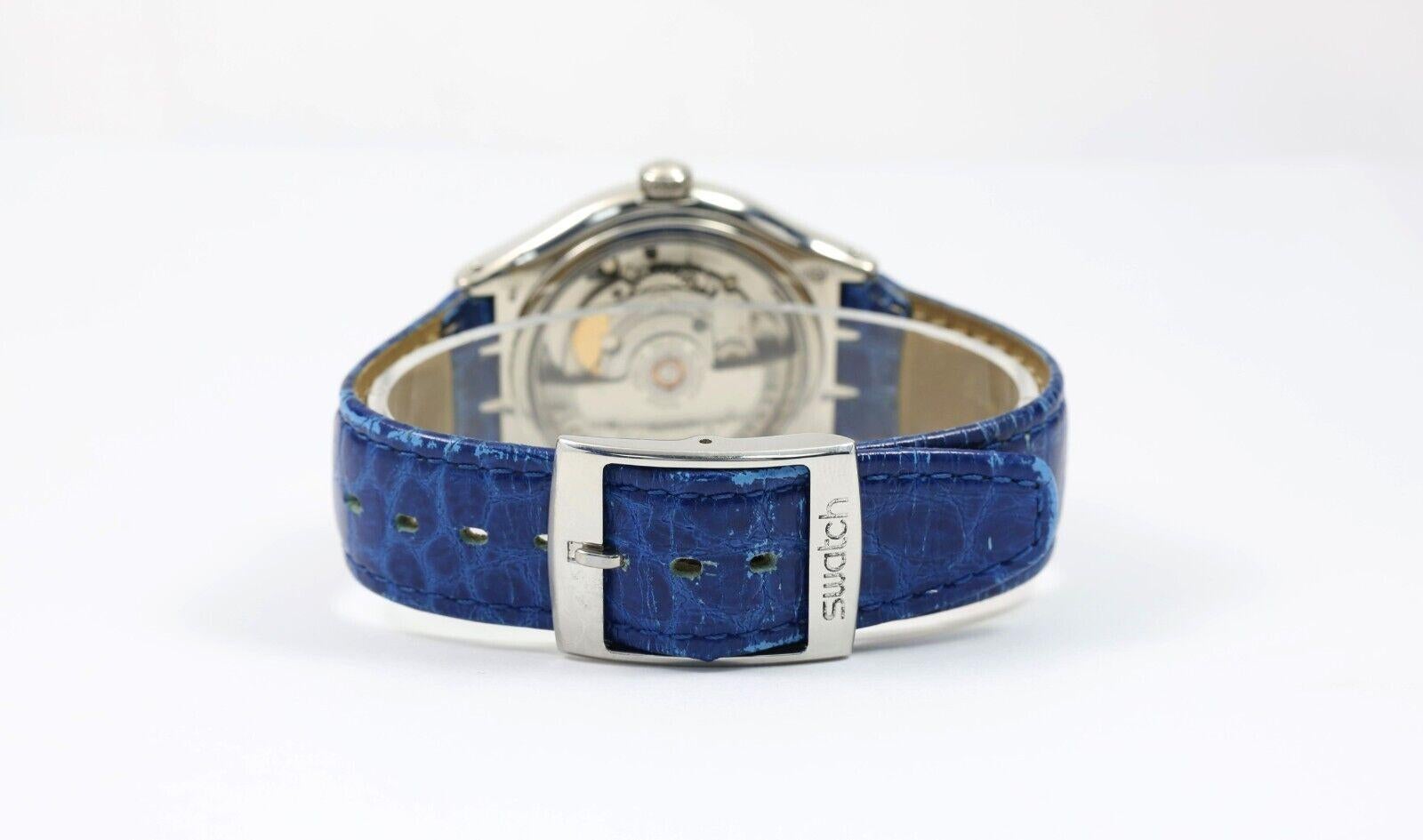 Reloj Swatch Vintage Tresor Magique Platino con estuche de presentación en venta 2