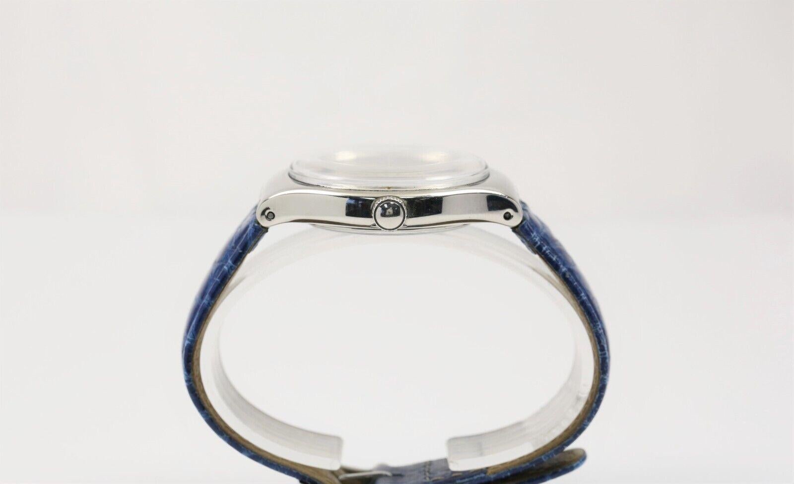 Reloj Swatch Vintage Tresor Magique Platino con estuche de presentación en venta 4