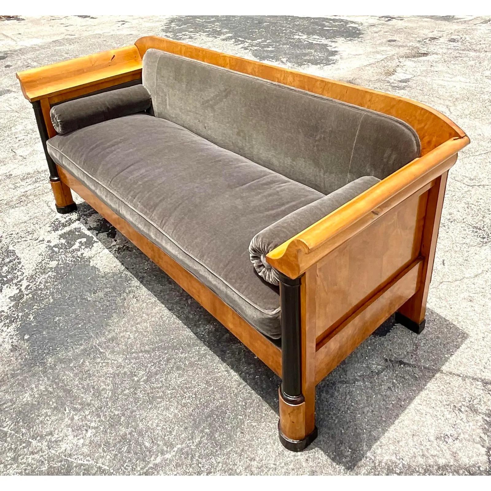 Incredible vintage Swedish Biedermeier sofa. Beautiful Burl wood maple frame with a chic grey mohair upholstery. Glossy black classic details. Acquired from a Palm Beach estate.