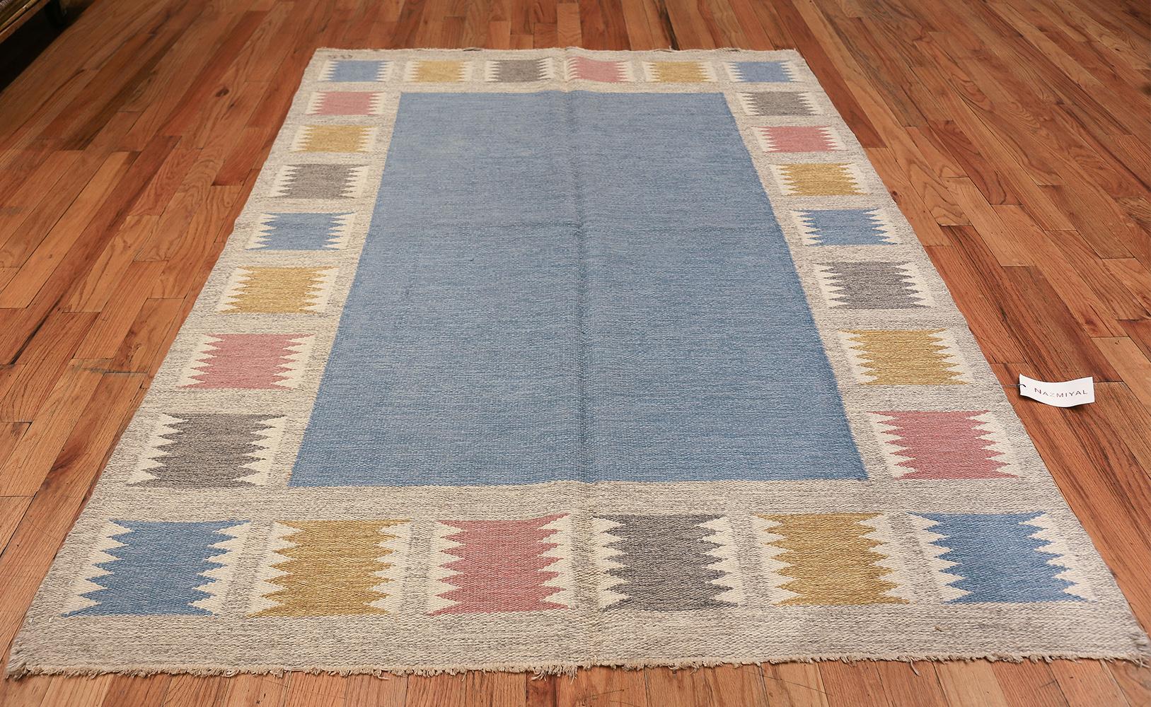 Vintage carpet by Birgitta Soderkvist, Sweden, mid-20th century. Size: 5 ft. 5 in x 7 ft. 9 in (1.65 m x 2.36 m)

True to its Swedish roots, the carpet features a Minimalist design that relies on subtle movements and vibrant colors to create depth