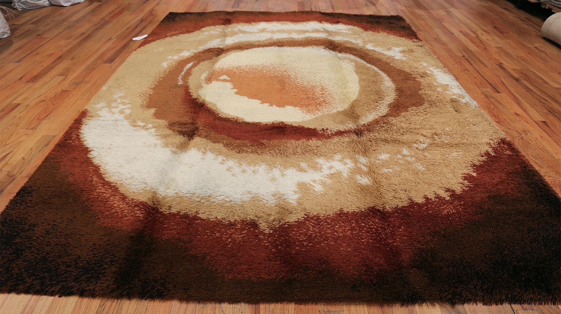 Vintage Swedish deco rug, Origin: Sweden, circa mid-20th century, size: 8 ft. 2 in x 11 ft. (2.49 m x 3.35 m)

Rendered in a handsome selection of warm coffee browns, this sophisticated vintage Swedish rug takes the genre of latte art to a new