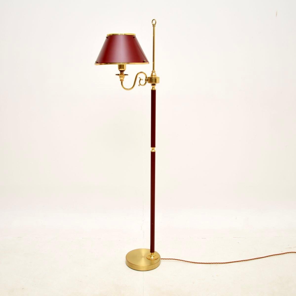 A stylish and extremely well made vintage Swedish enameled tole and brass floor lamp by Borens. This was recently imported from Sweden, it dates from around the 1970’s.

The quality is superb, this is beautifully made with the brass finish and red