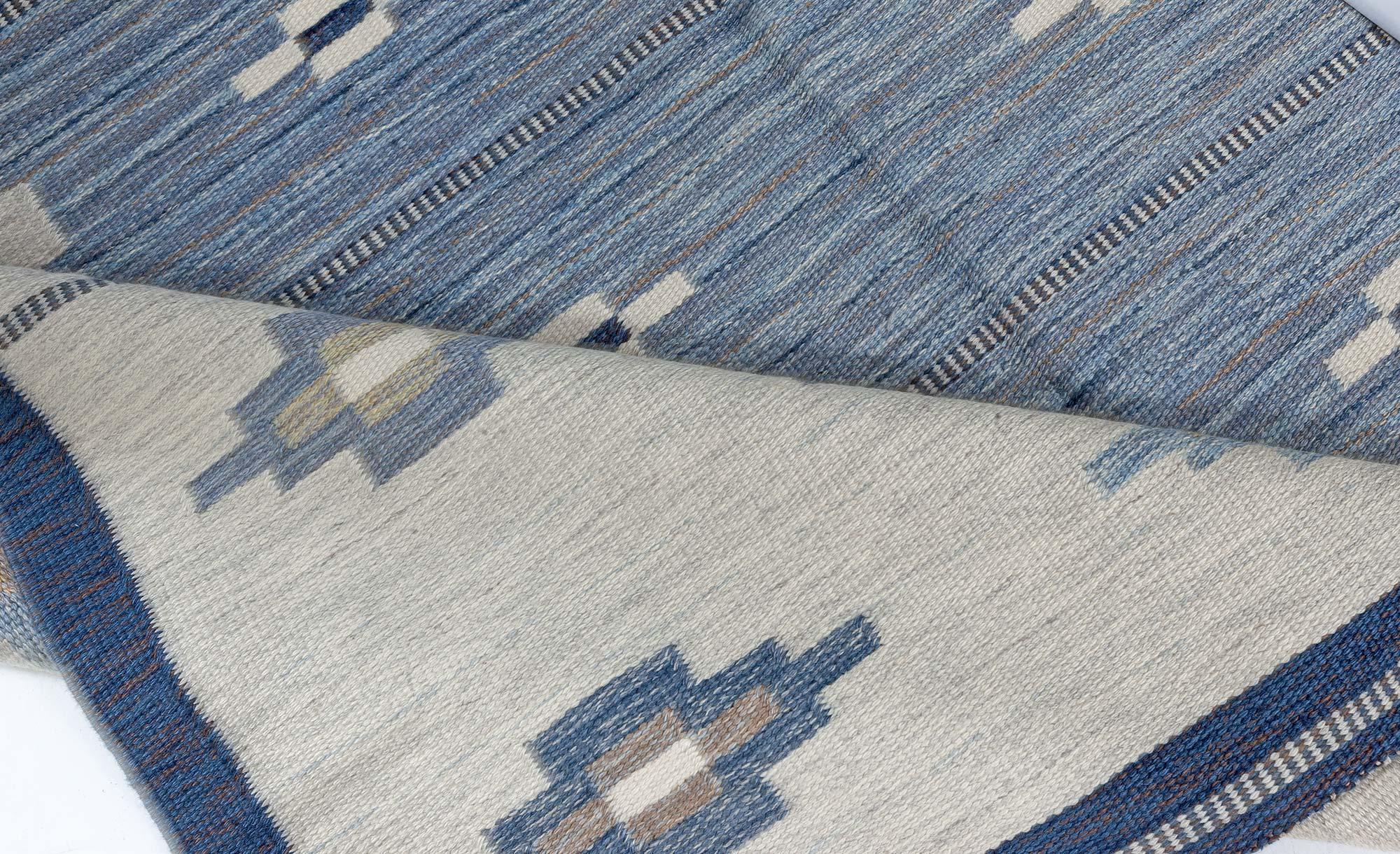 Vintage Swedish blue flat woven rug by Erik Lundberg
Size: 6'5