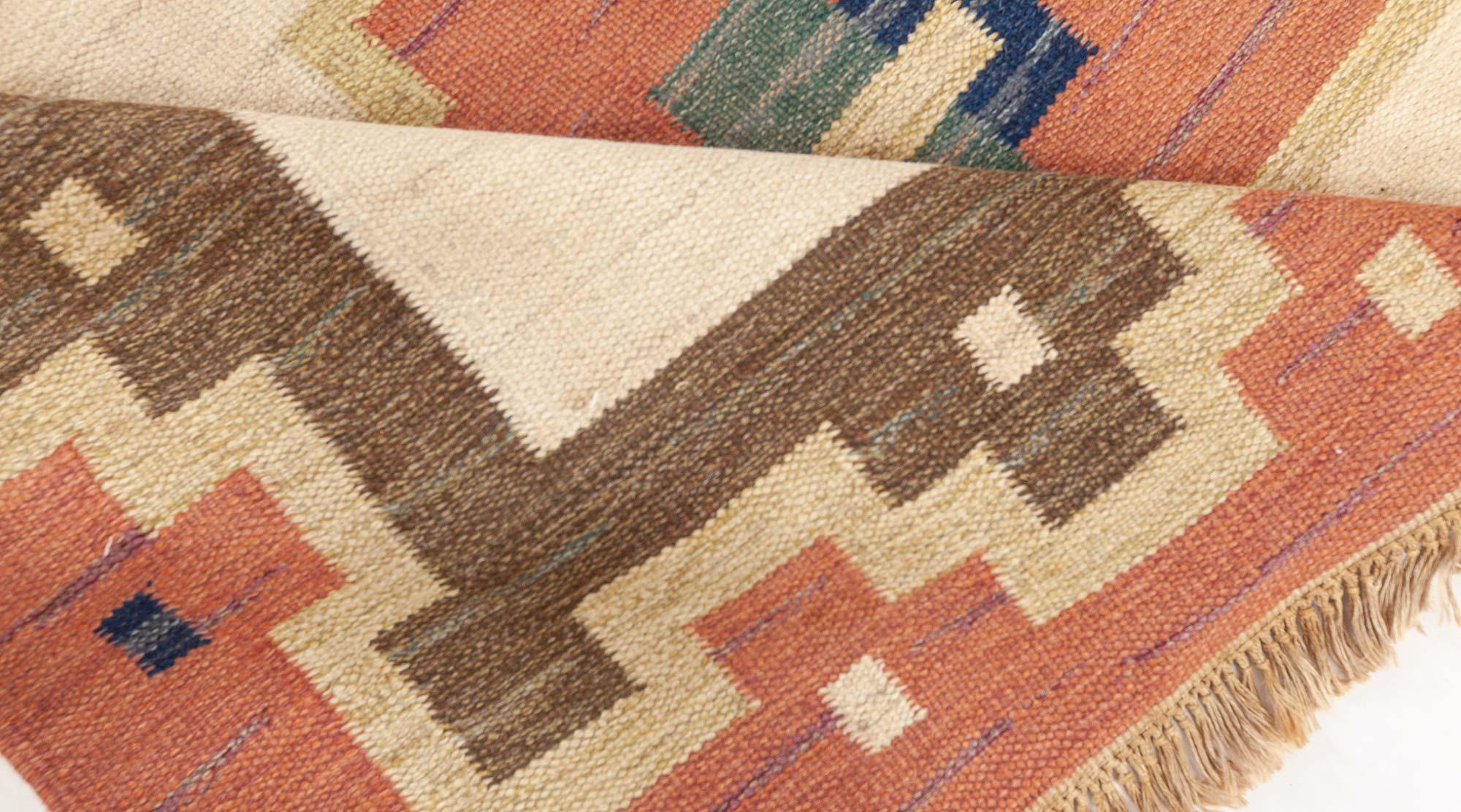 Vintage Swedish flat weave rug signed by (GK)
Size: 5'6