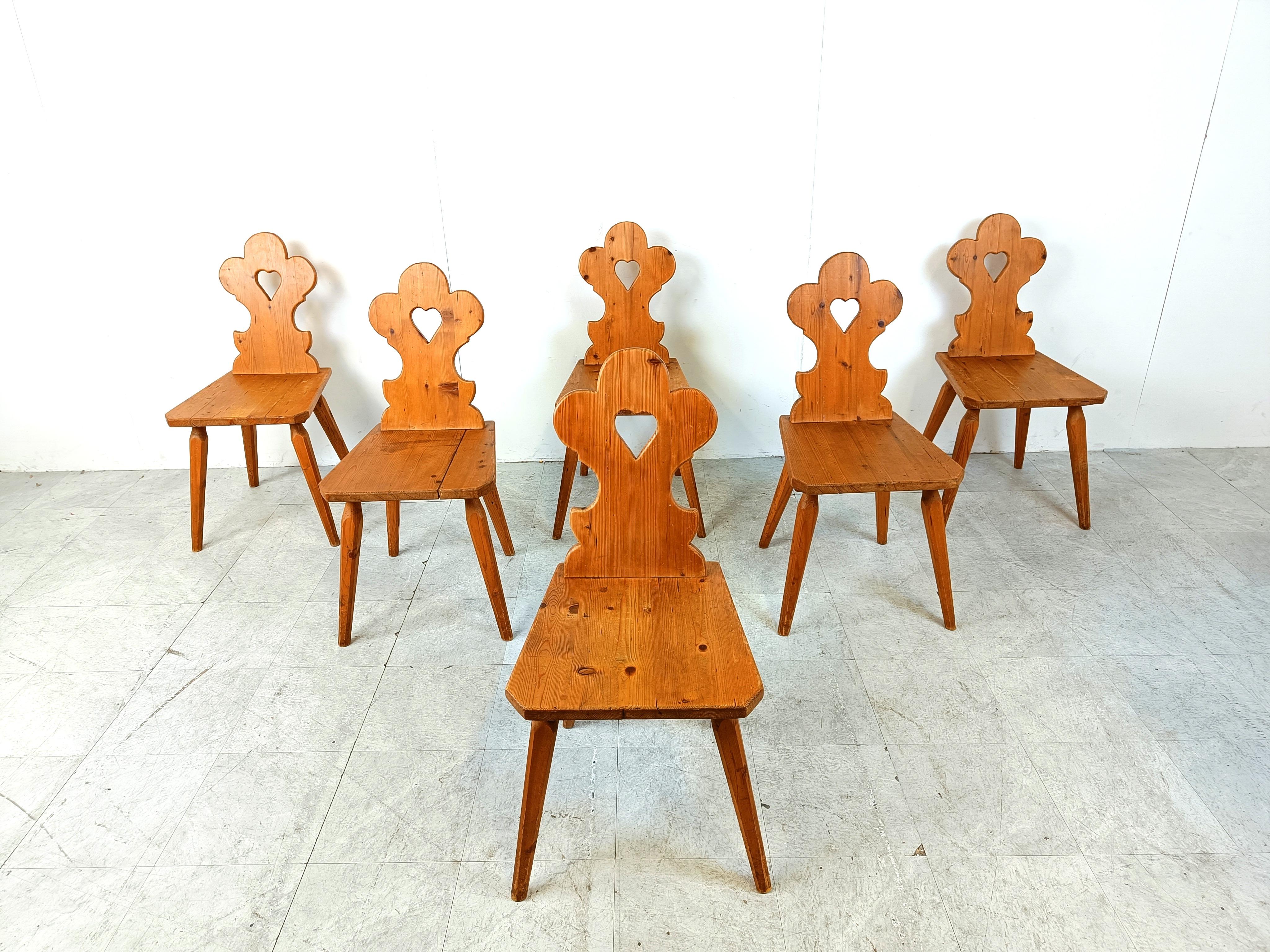 Vintage oak swedish folk art dining chairs

These rustic farm chairs were handcrafted and show good craftsmenship.

Good condition with normal age related wear

1960s - Sweden

Dimensions:
Height: 93cm/36.61