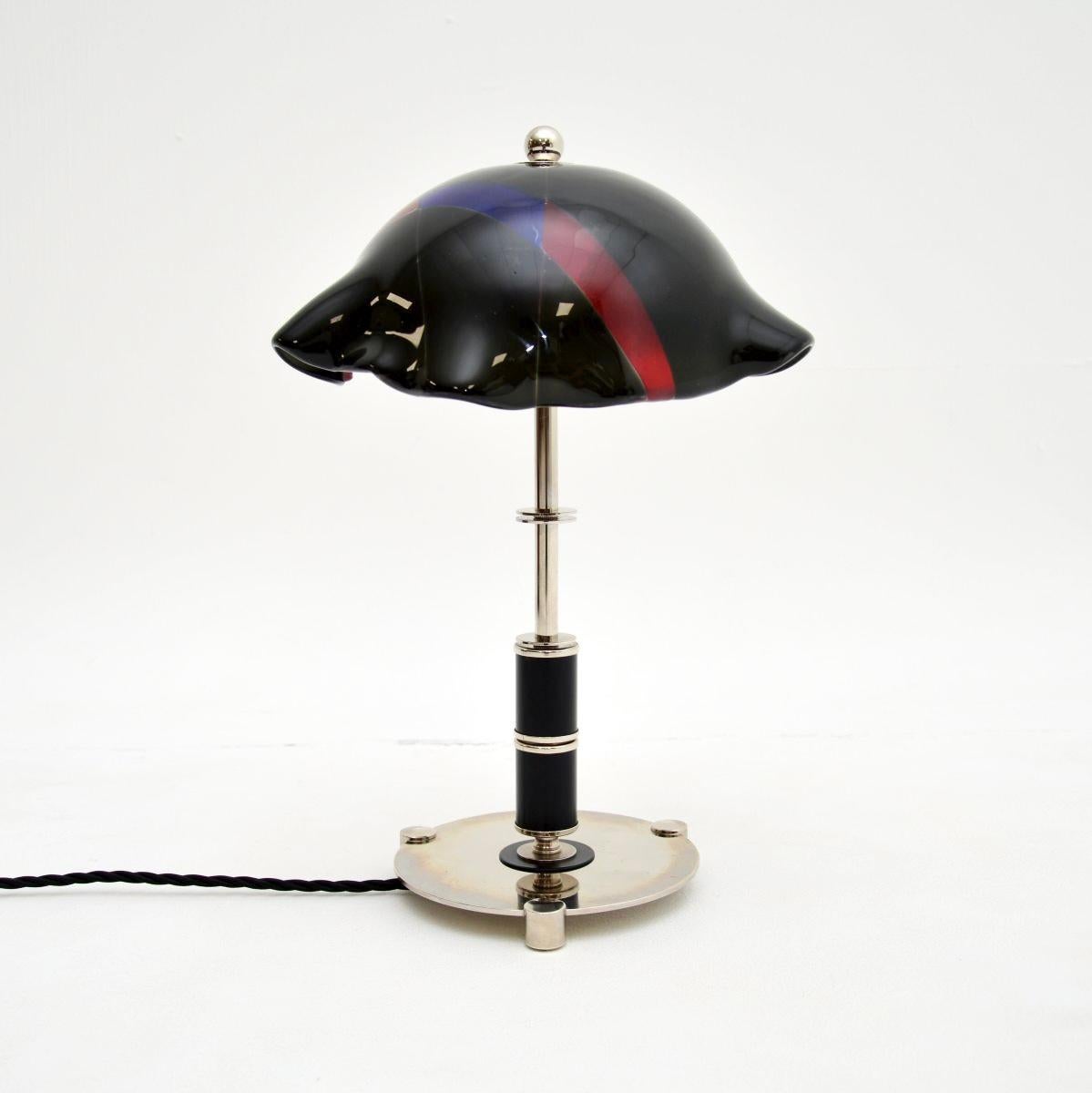 A wonderful vintage Swedish glass and chrome table lamp. This was recently imported from Sweden, it dates from around the 1970’s.

It is of superb quality, with a gorgeous coloured glass mushroom shaped shade. The frame is beautifully made from