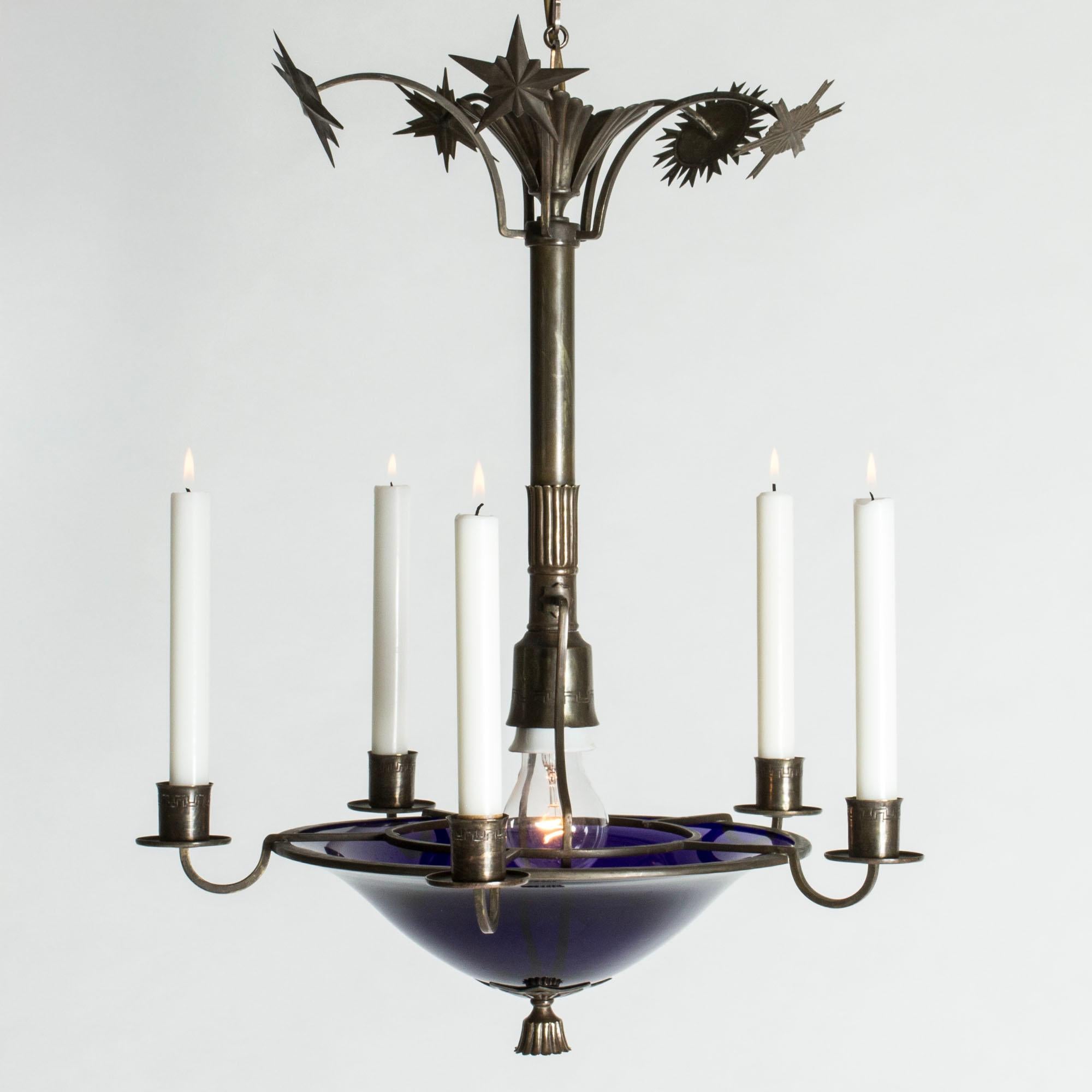 Beautiful Swedish Grace ceiling light in a large size. Made from bronze with a large, wide frosted glass shade. Elaborate, sculptural decor of a man, woman and a deer in stylized foliage. Lovely attention to detail.