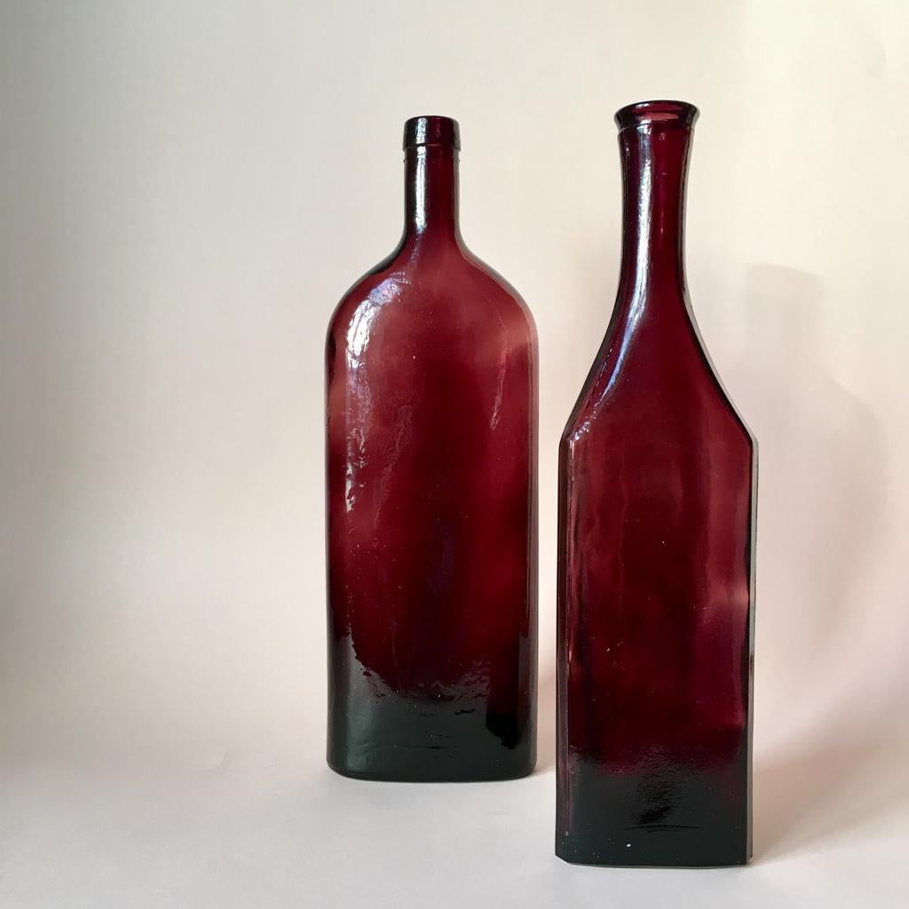 Really nice maroon color decorative bottles or vases.
Left bottle - H 34 cm, W 11 cm, D 5 cm
Right bottle - H 32.5 cm, W 8 x 8 x 8 cm.