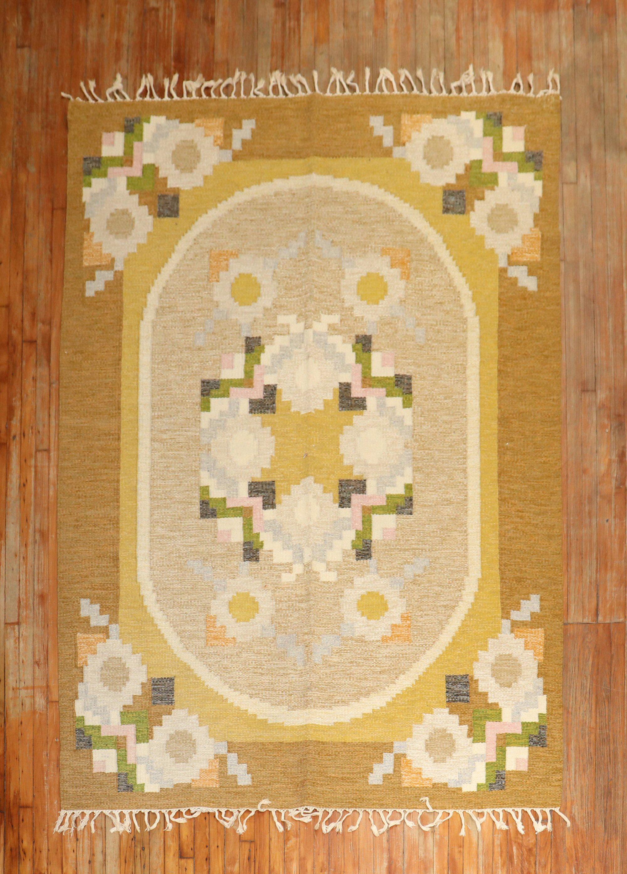 Intermediate-size one of a kind mid-20th century Swedish Kilim with a floral design in green yellow and brow

Measures: 6'5'' x 9'3