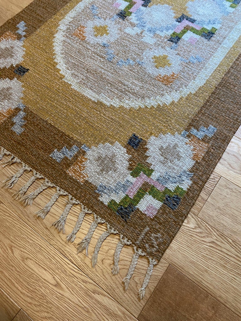 Beautiful Vintage Swedish Kilim runner by Ingegerd Silow with a geometric flower pattern. This design is called 