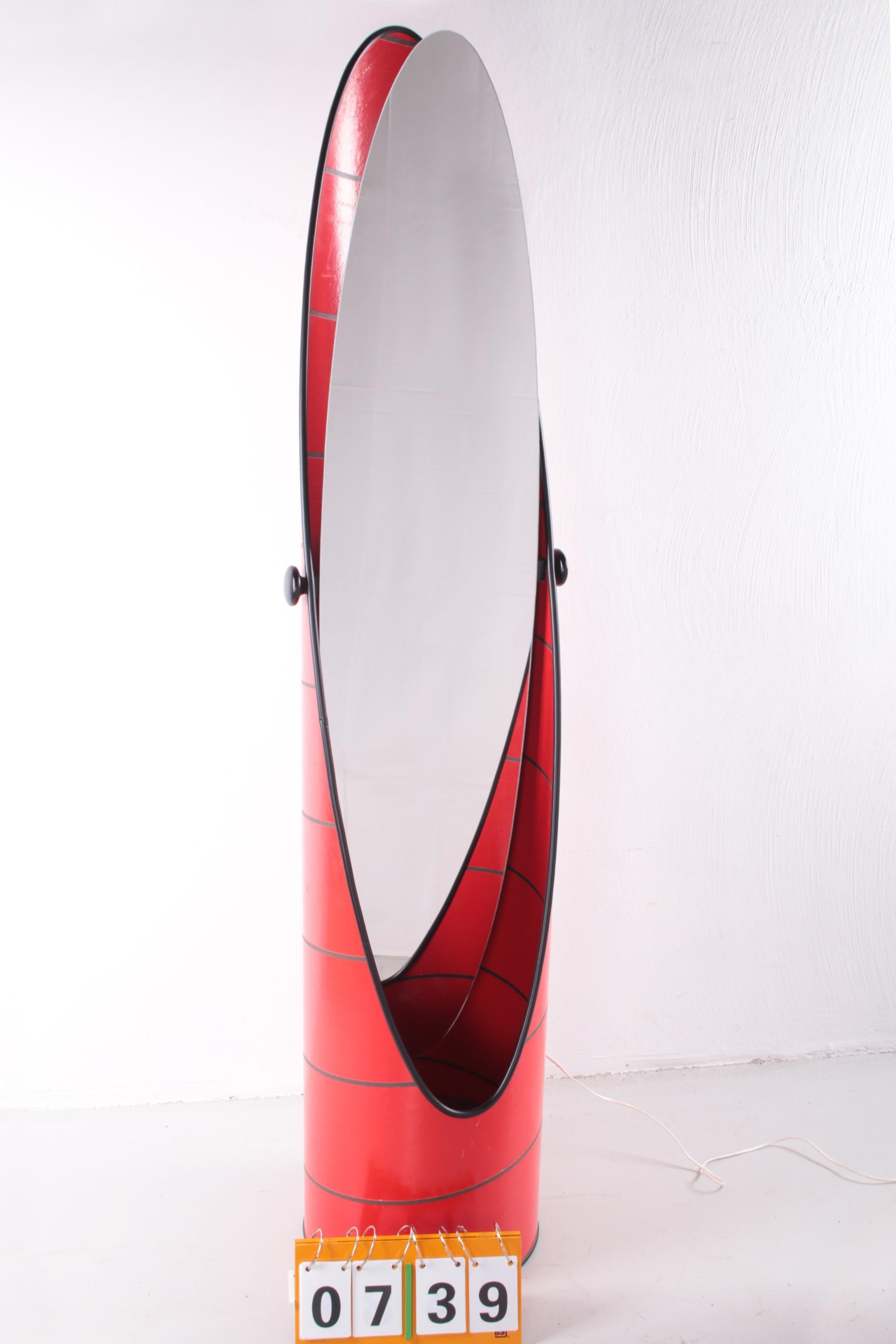 This is a beautiful full-length mirror with lighting in it.

Made in Sweden with adjustable mirror and there is also lighting.

Beautiful red with black accents.

Beautiful in the hall or shop and or your bedroom.


    