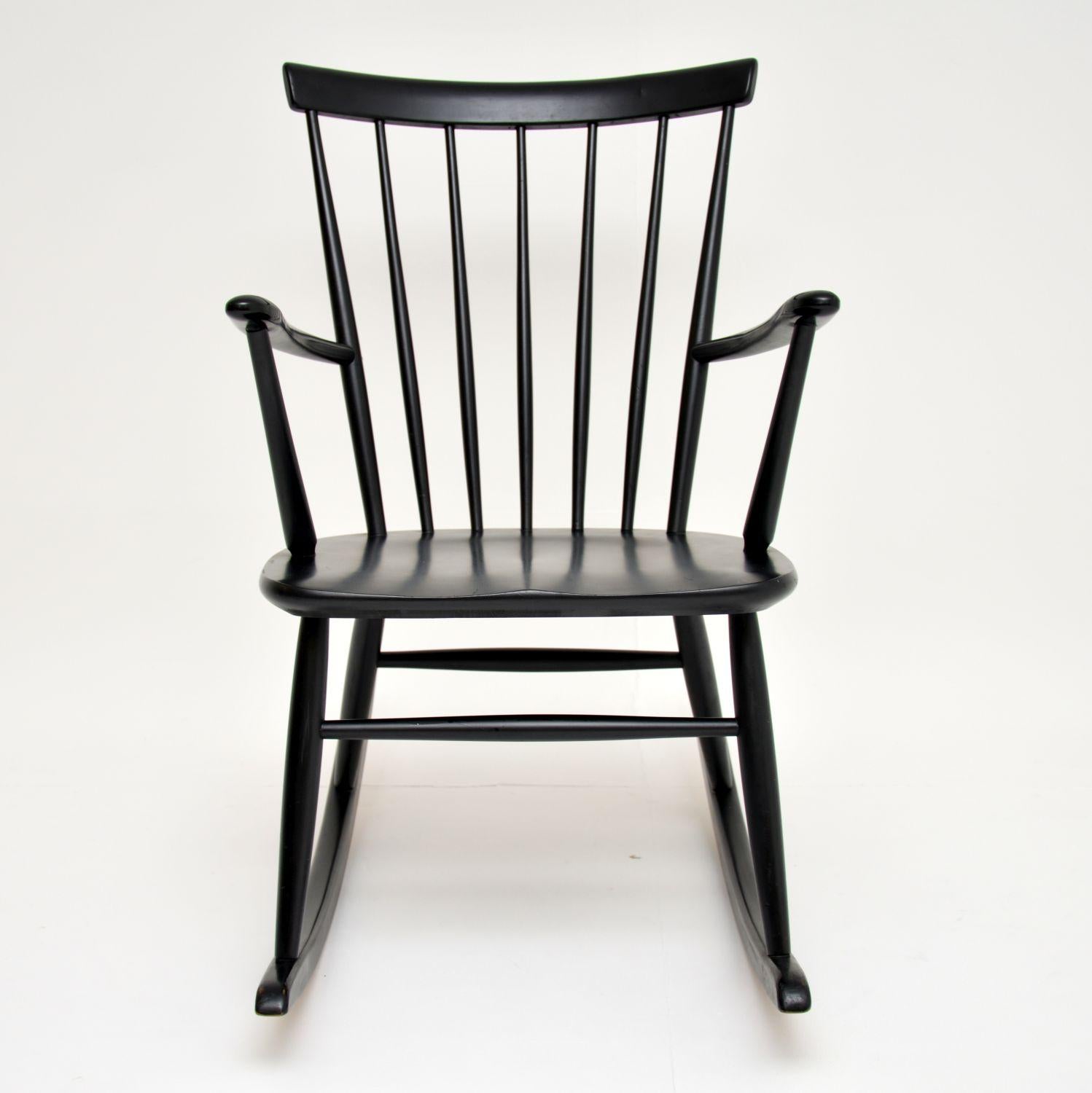 A stylish and extremely well made vintage Swedish rocking chair by Roland Rainer for Hagafors. It was was made in Sweden, it dates from the 1960-70’s.

It’s made from ebonised solid wood, and the condition is superb for its age. There is just some