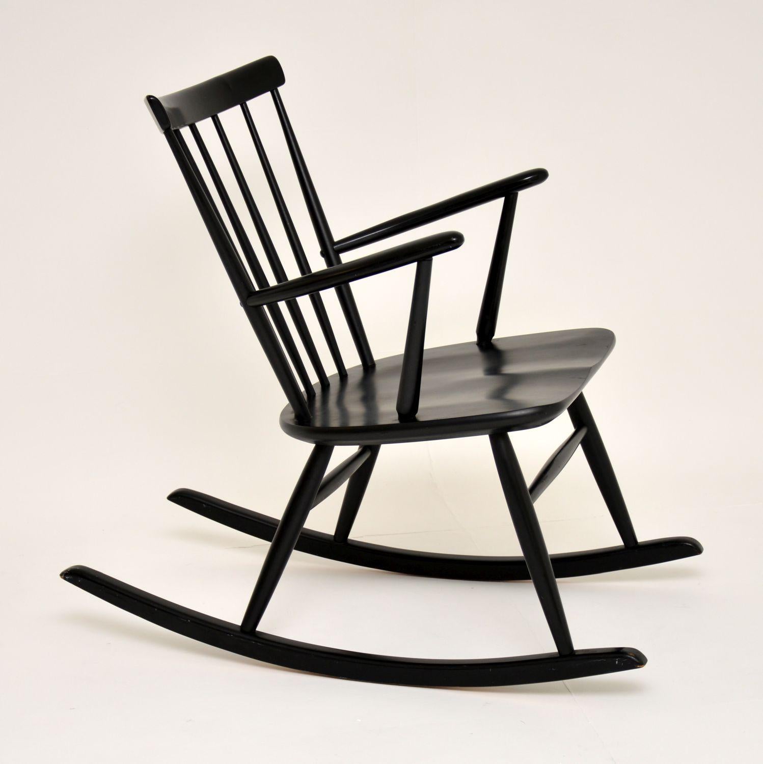 Mid-Century Modern Vintage Swedish Rocking Chair by Roland Rainer for Hagafors For Sale