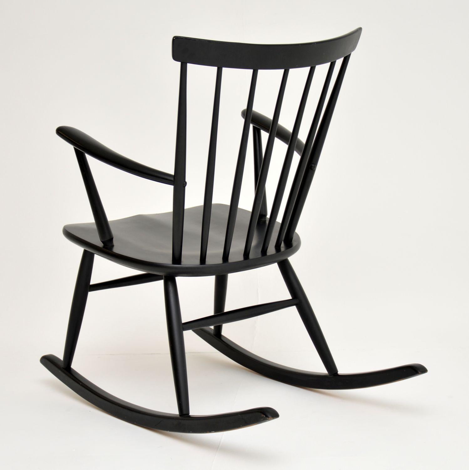 Mid-20th Century Vintage Swedish Rocking Chair by Roland Rainer for Hagafors For Sale