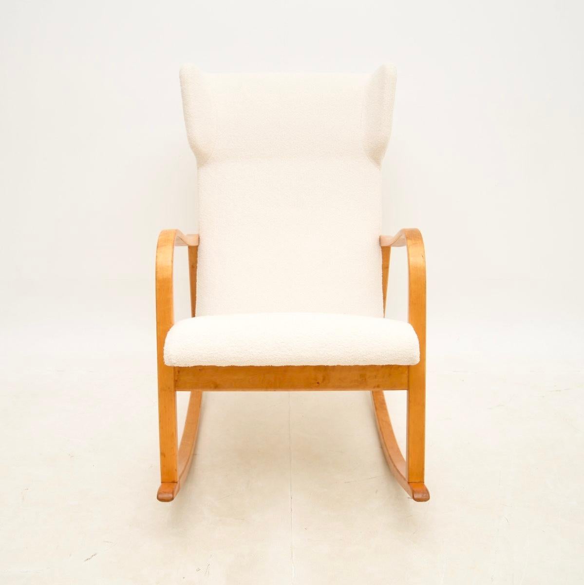 A very stylish and extremely comfortable vintage Swedish rocking chair in satin birch, dating from the 1960’s.

The quality is superb and this is extremely comfortable to relax in. The satin birch frame has a beautiful mellow colour tone and
