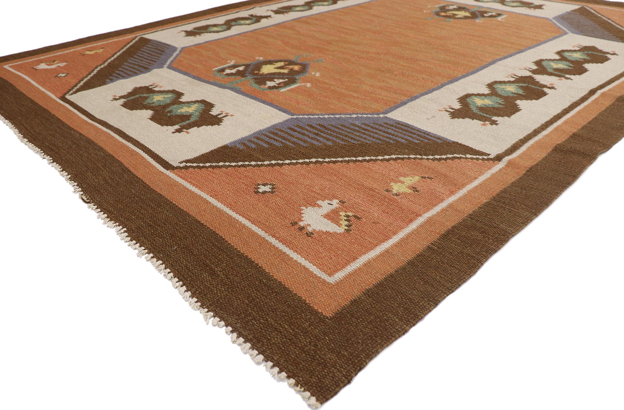 78110, vintage Swedish Rollakan Kilim rug with Scandinavian Modern style. With its geometric design and modern hygge vibes, this hand-woven wool Swedish Kilim rug beautifully embodies the simplicity of Scandinavian modern style. Animals and a cross