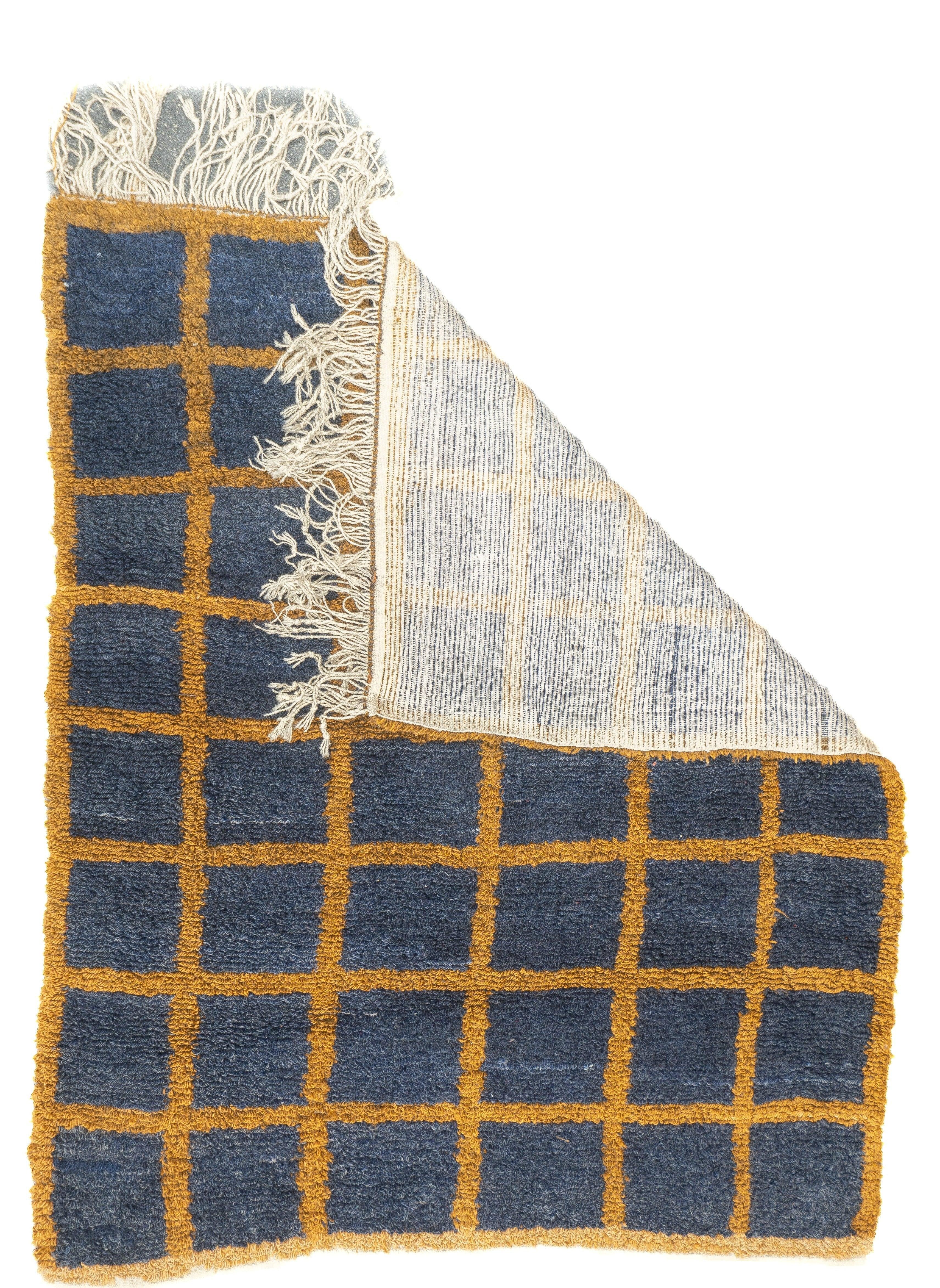Vintage Swedish Rug 4'1'' x 4'10''. A six by eight orthogonal lattice in orange-rust is set on a slate field generating rough squares, a long, nearly shaggy, pile. Cotton warp with fringe at one end. Fun and furry. Minimal and wooly. Good condition.