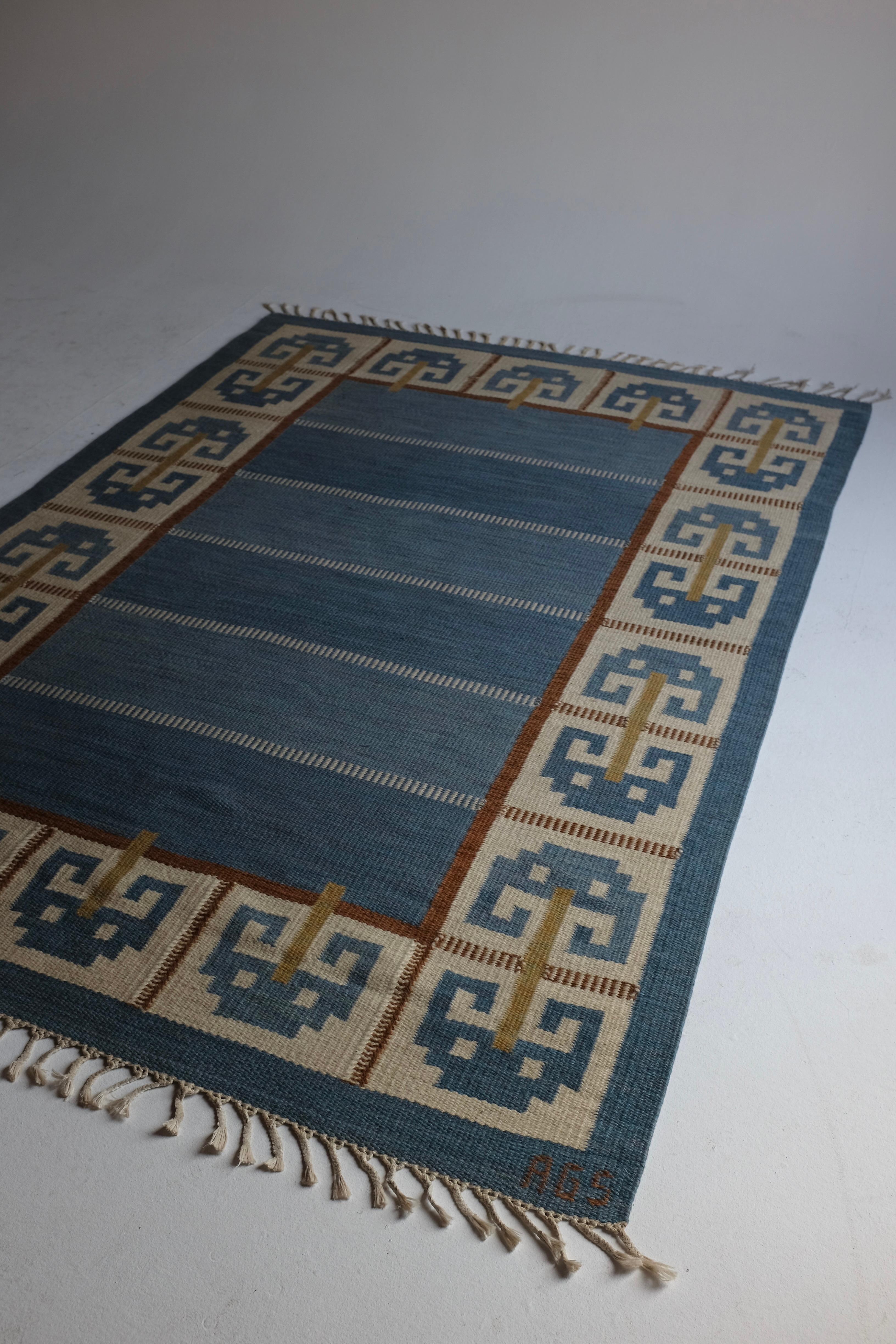 Vintage Swedish Kilim rug in the design called 