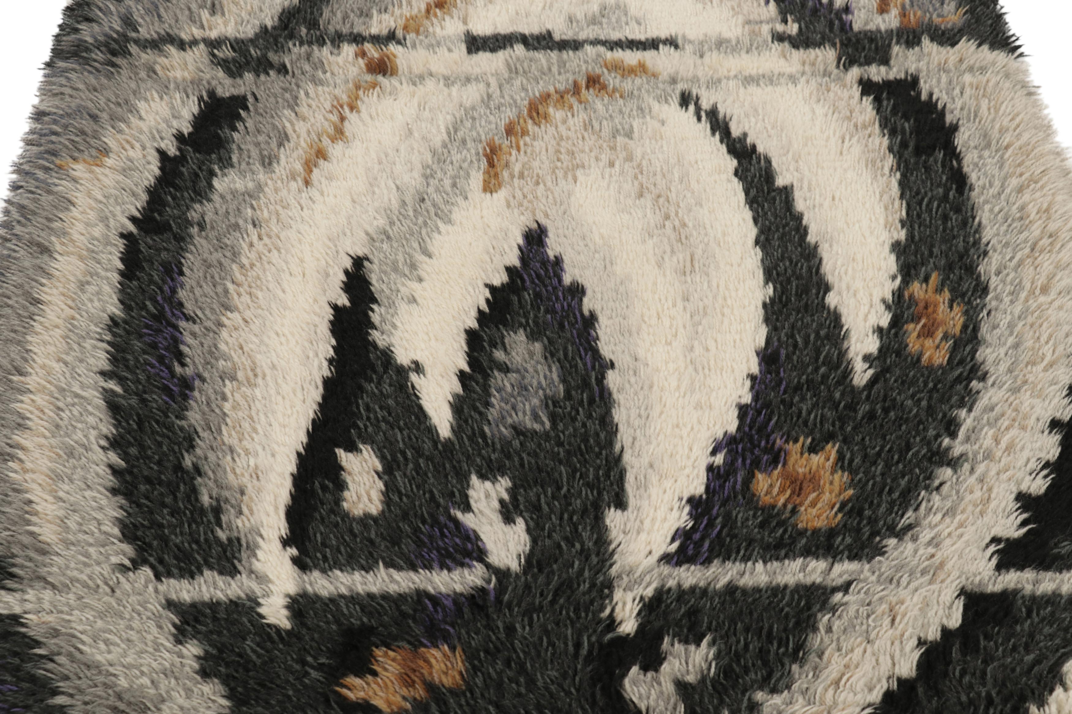 Hand-knotted in lush, high-pile wool in Sweden circa 1960-1970, this 4x6 vintage Swedish Rya rug is a bold new addition to Rug & Kilim’s curation of iconic, collectible mid-century Scandinavian rugs of this provenance. 

On the Design:
