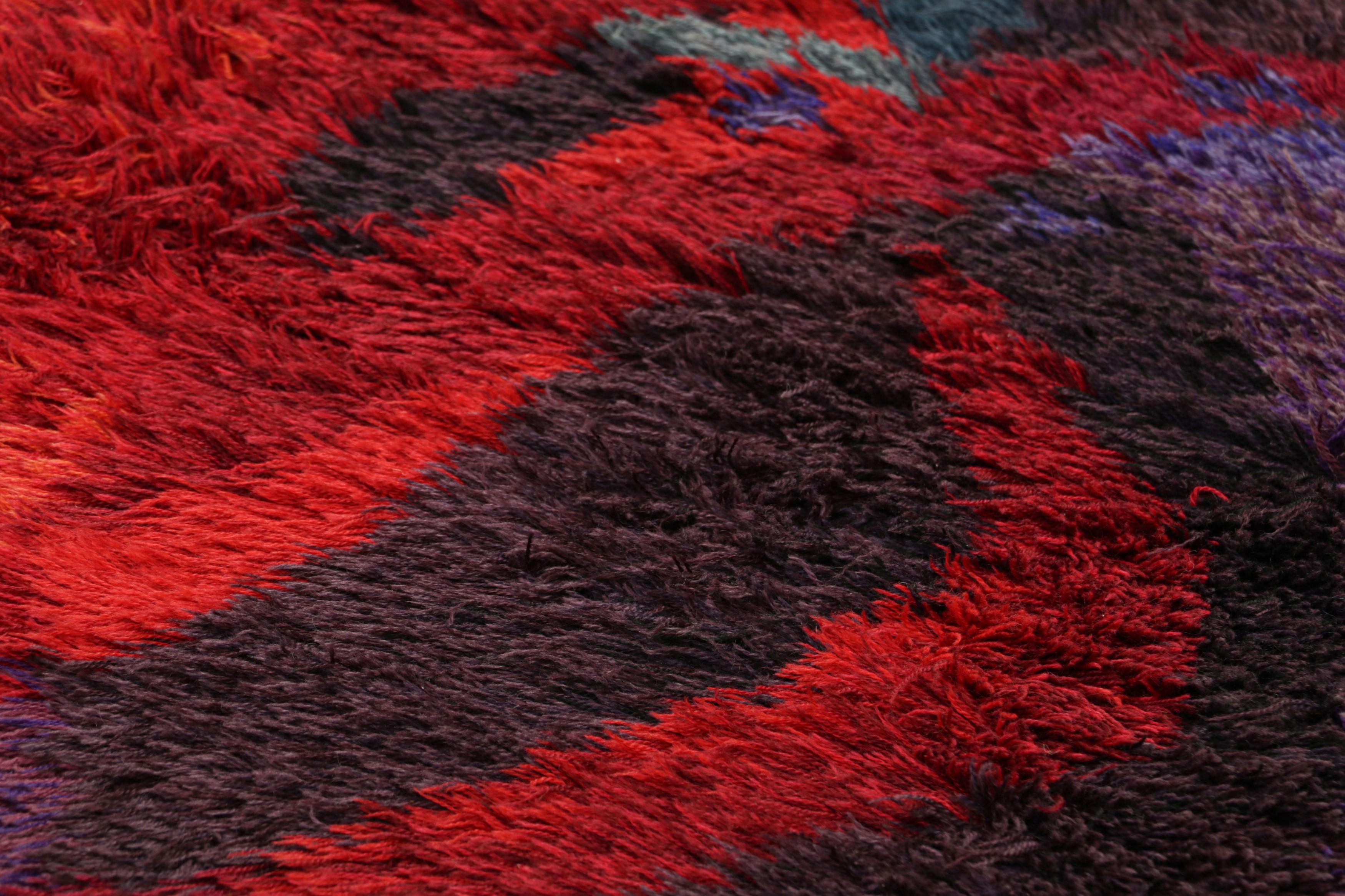 Hand-knotted in lush, high-pile wool in Sweden circa 1960-1970, this 5x7 vintage Swedish Rya rug is a bold new addition to Rug & Kilim’s curation of rare and collectible mid-century rugs of this provenance.

On the Design: 

Connoisseurs will