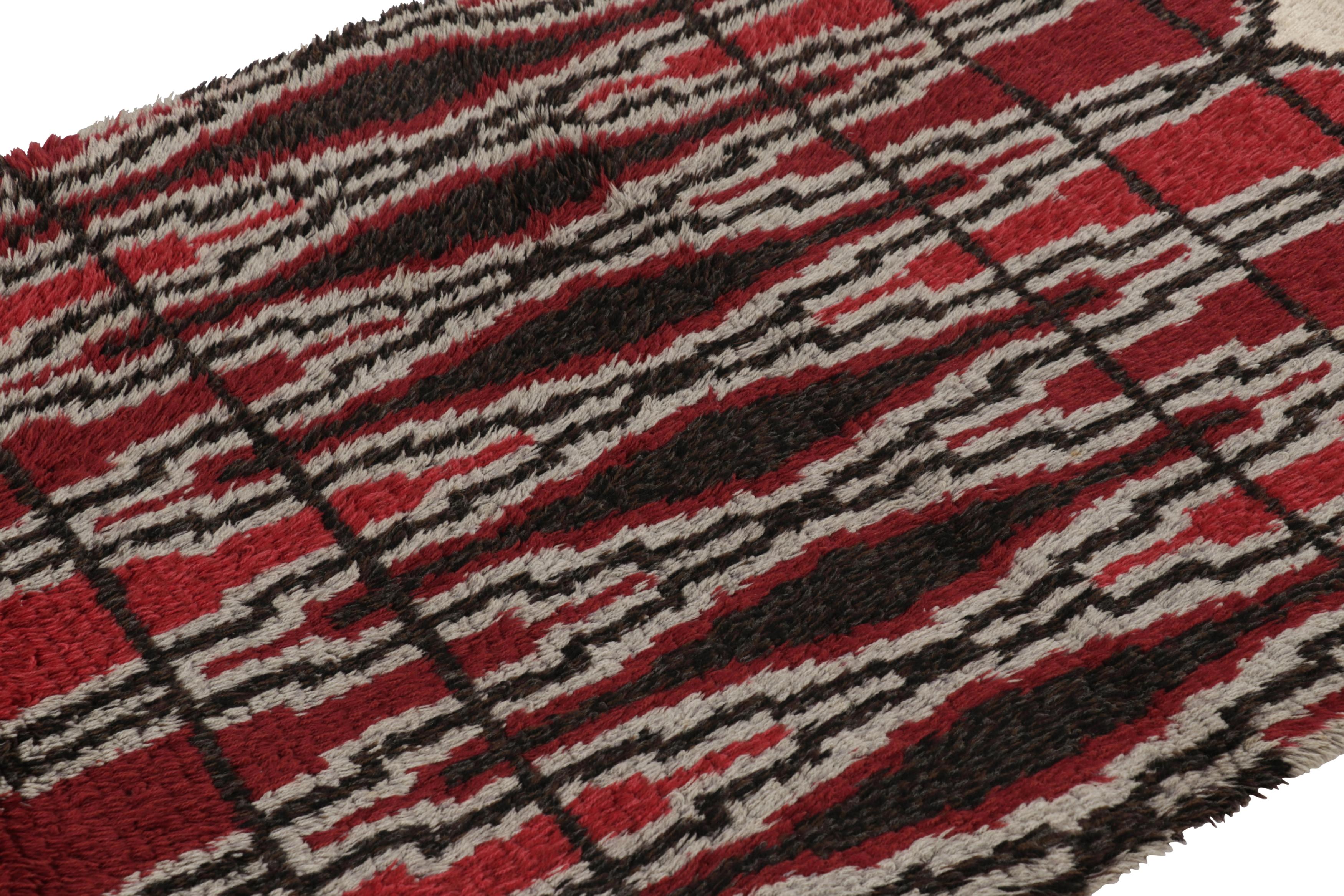 Hand-knotted in lush, high-pile wool in Sweden circa 1960-1970, this 5x7 vintage Swedish Rya rug is a bold new addition to Rug & Kilim’s curation of iconic, collectible mid-century Scandinavian rugs of this provenance. 

On the Design: