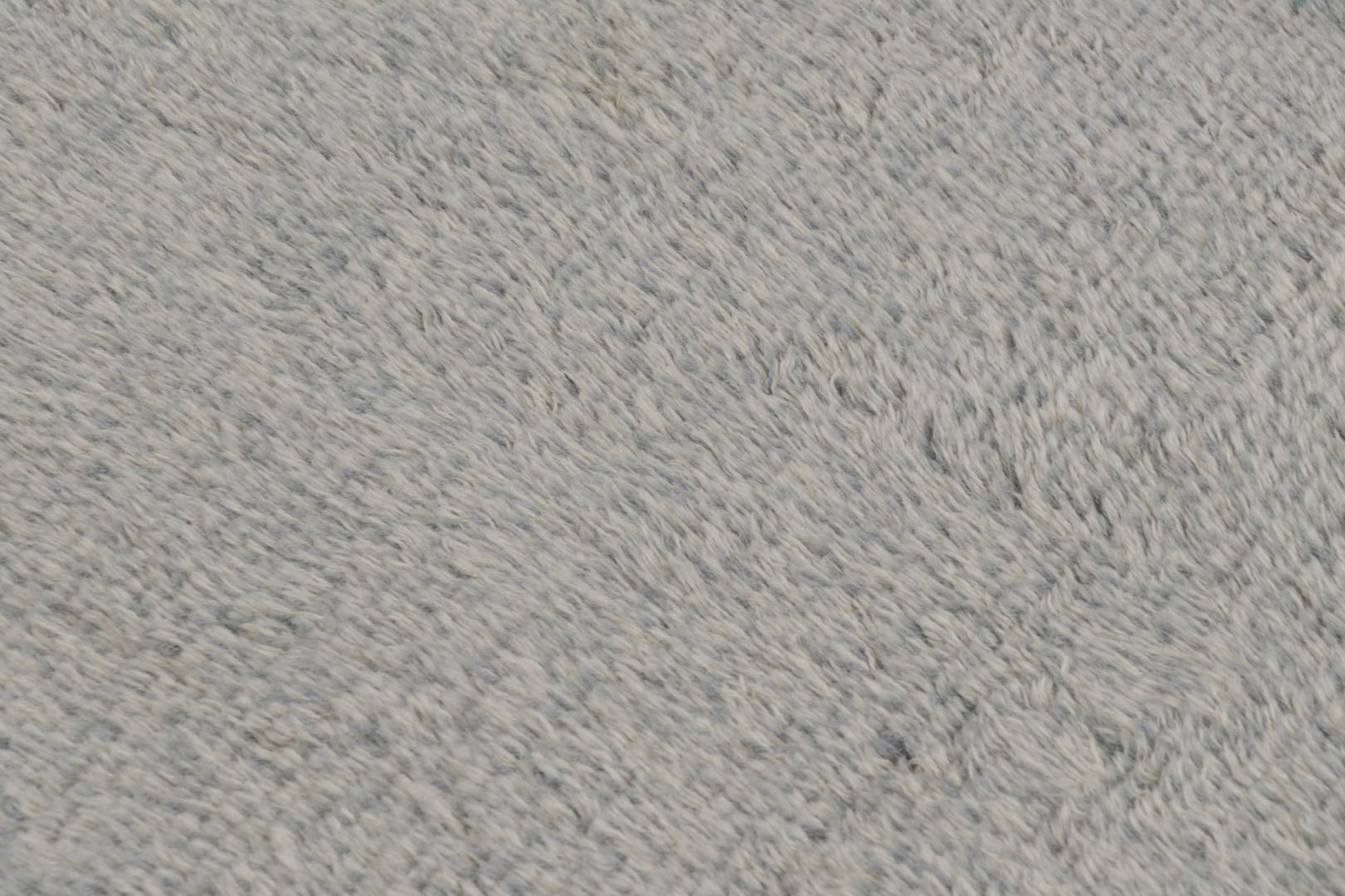 Hand-knotted in lush, high-pile wool in Sweden circa 1960-1970, this 4x6 vintage Swedish rya rug is one of few signature pieces ever curated in this style, and an exceptional new addition to Rug & Kilim’s curation of iconic, one-of-a-kind