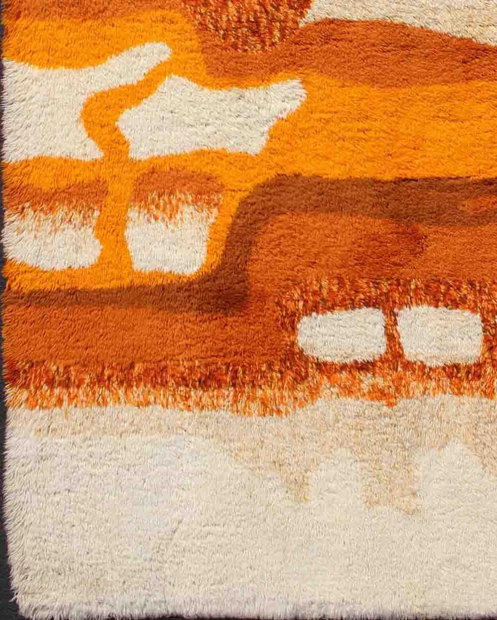 Measures: 5'4 x 7'7.
This lovely Swedish Rya rug with modern design features a vibrant color palette of cream, brown, red, Burnt Orange and orange. It is a great choice for any contemporary interiors and modern setting. 
Vintage Swedish Rya rug