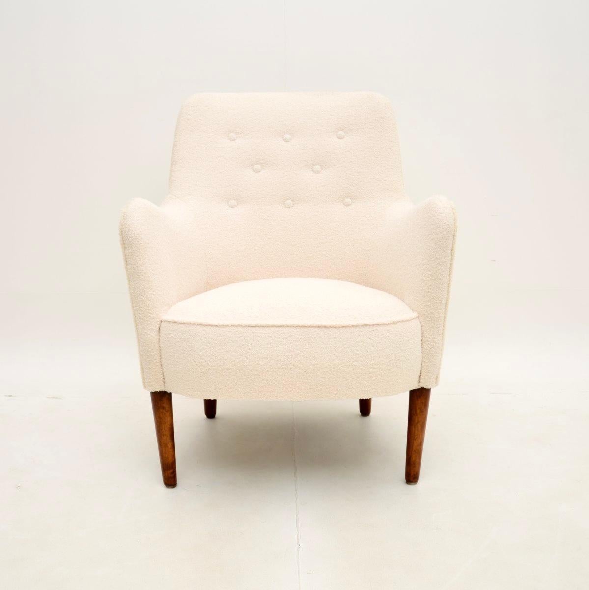 A stylish and extremely well made vintage Swedish Sampsel armchair by Carl Malmsten. It was made in Sweden, it dates from around the 1960’s.

This is of exceptional quality and is extremely comfortable. It is sturdy and supportive, the sweeping