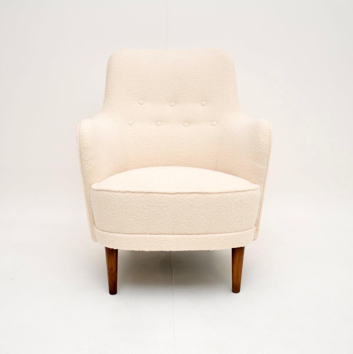 A stylish and iconic vintage Swedish Samsas armchair by Carl Malmsten. It was made in Sweden, it dates from around the 1960’s.

This is of exceptional quality and is extremely comfortable. It is sturdy and supportive, the sweeping curves make it