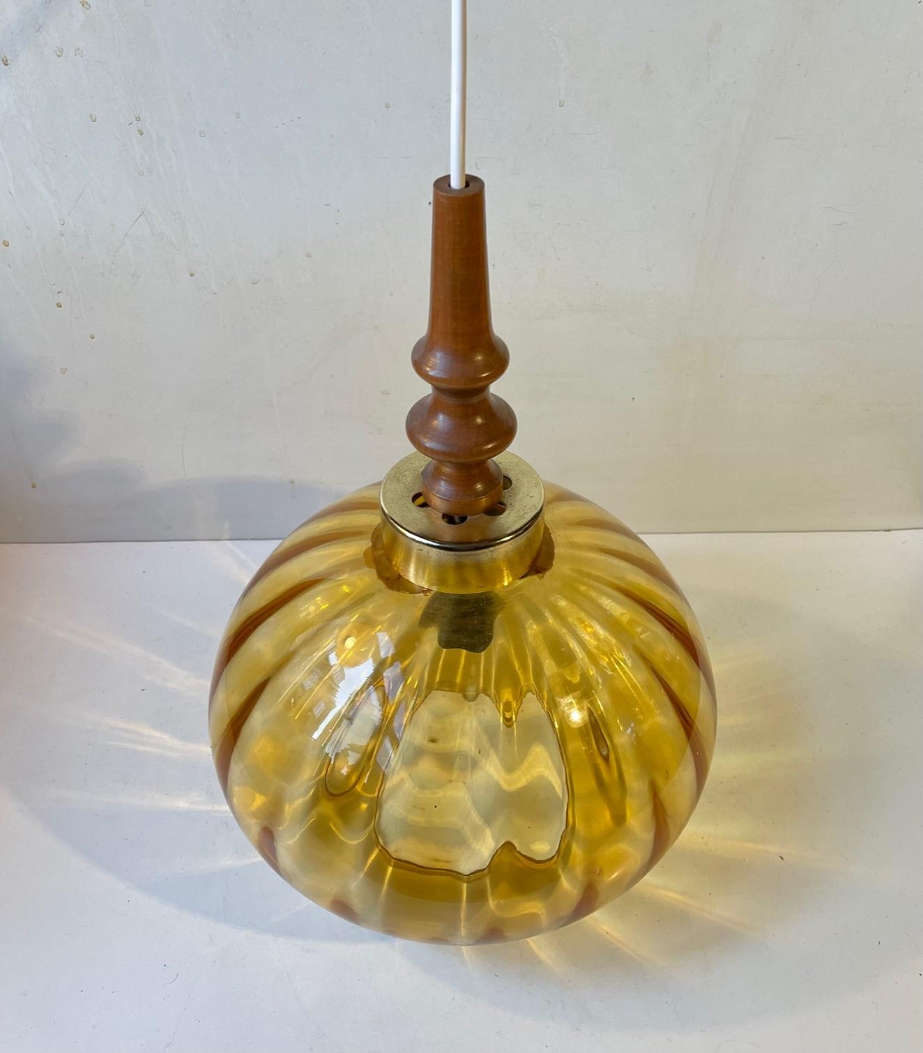 Late 20th Century Vintage Swedish Sunburst Pendant Lamp in Blown Optical Honey Glass, 1970s For Sale